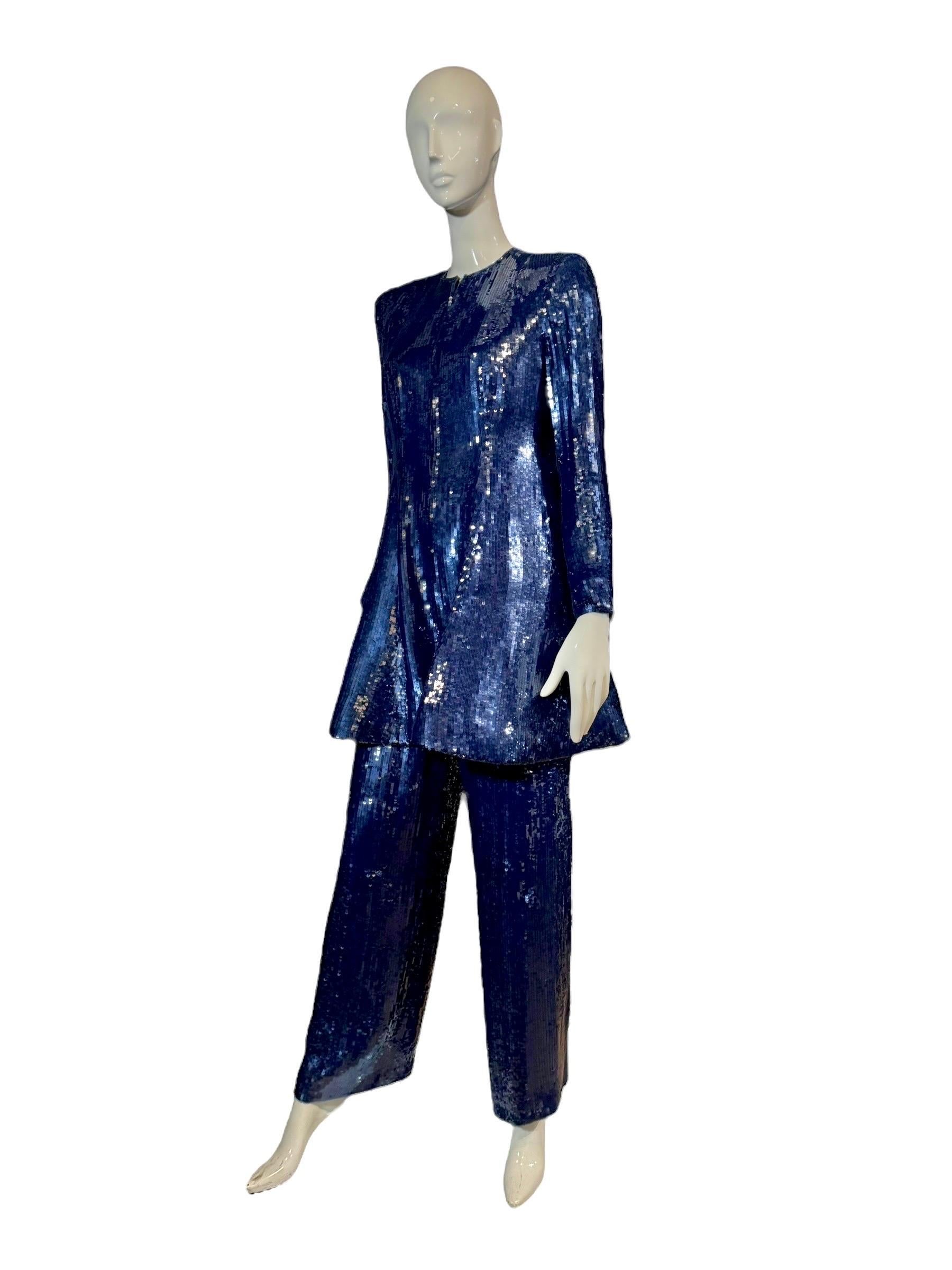Conjunto de top estructurado de lentejuelas azules y pantalones de cintura alta John Anthony Couture ¡Único en el estudio 54!

Deslumbra con este conjunto único de John Anthony Couture, que incluye una escultural chaqueta con cremallera y unos