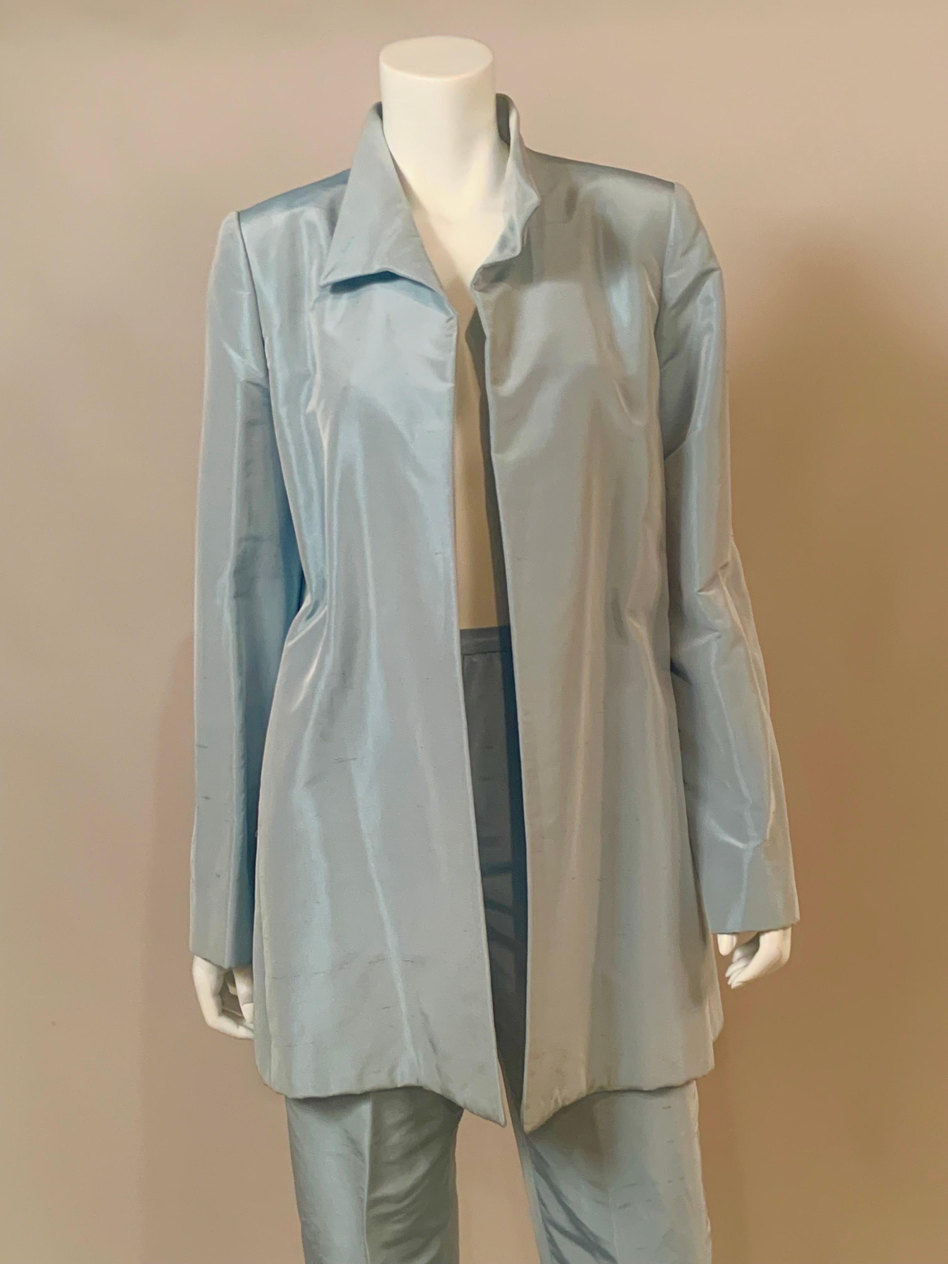New York Designer John Anthony is now working exclusively with Private Clients and this is an example of his couture level designs.  Ice blue silk is used for this jacket and pants suit, it is so clean lined and elegant that no decoration is needed.