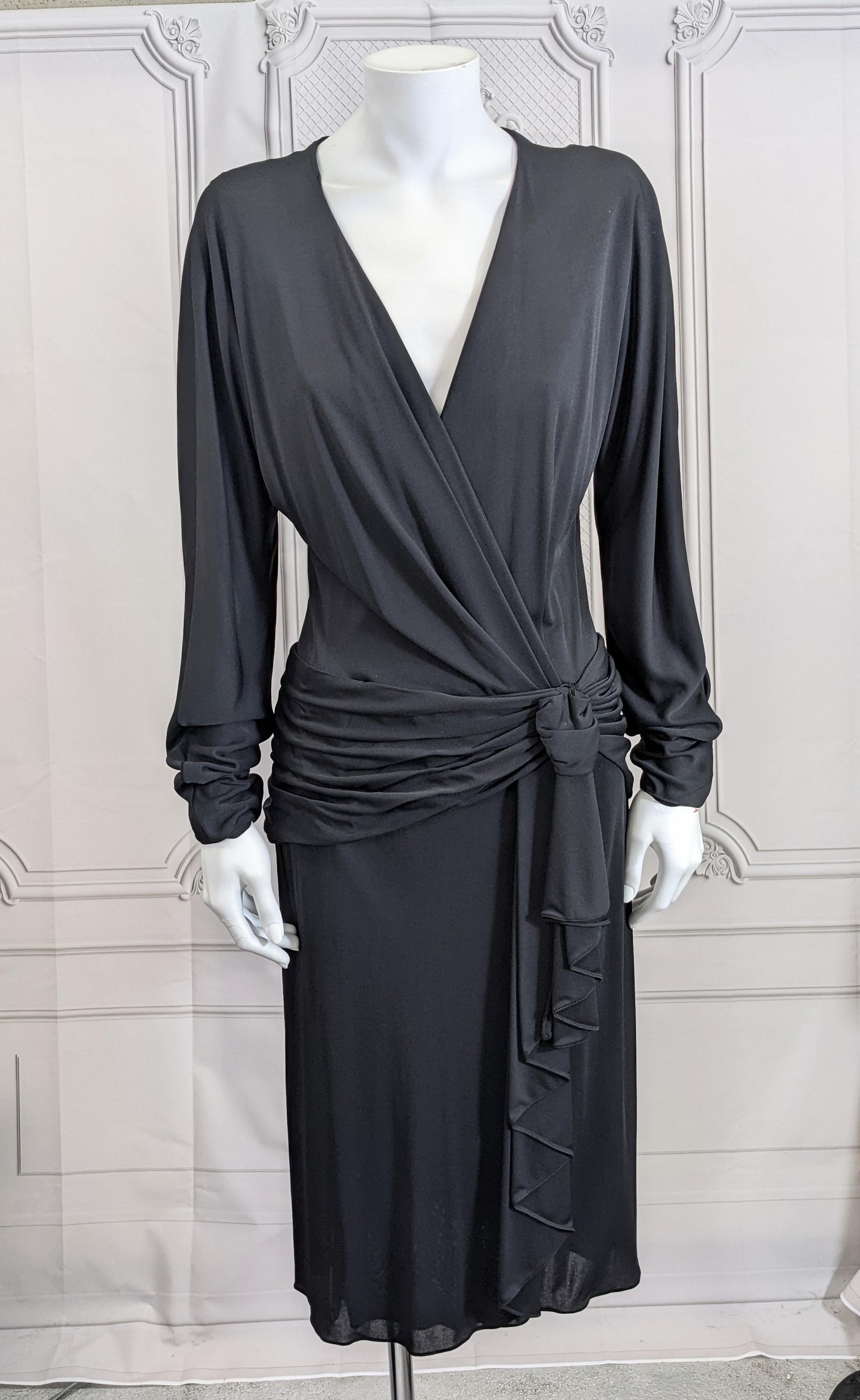 John Anthony Sexy Matte Jersey Wrap Dress. Great classic wrap style with one hook closure with draped cascade knot at hip. Dress has an interior grosgrain belt for stability and a ruched panel that extends from front around to the back. Elongated