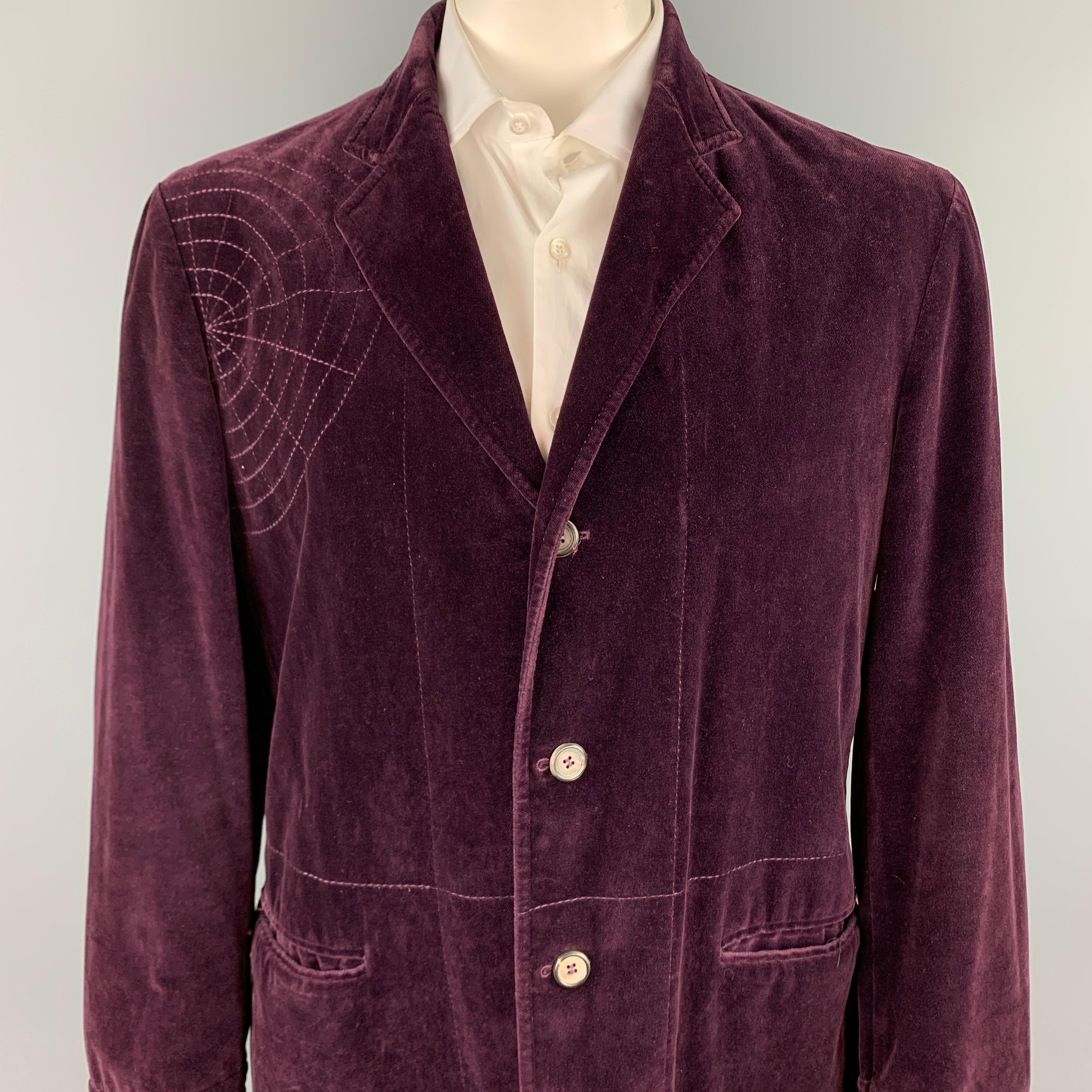 JOHN BARTLETT sport coat comes in a purple cotton velvet with a pink liner featuring a notch lapel, stitched design, slit pockets, and a three button closure. Made in Italy. 

Very Good Pre-Owned Condition.
Marked: IT 52

Measurements:

Shoulder: 20