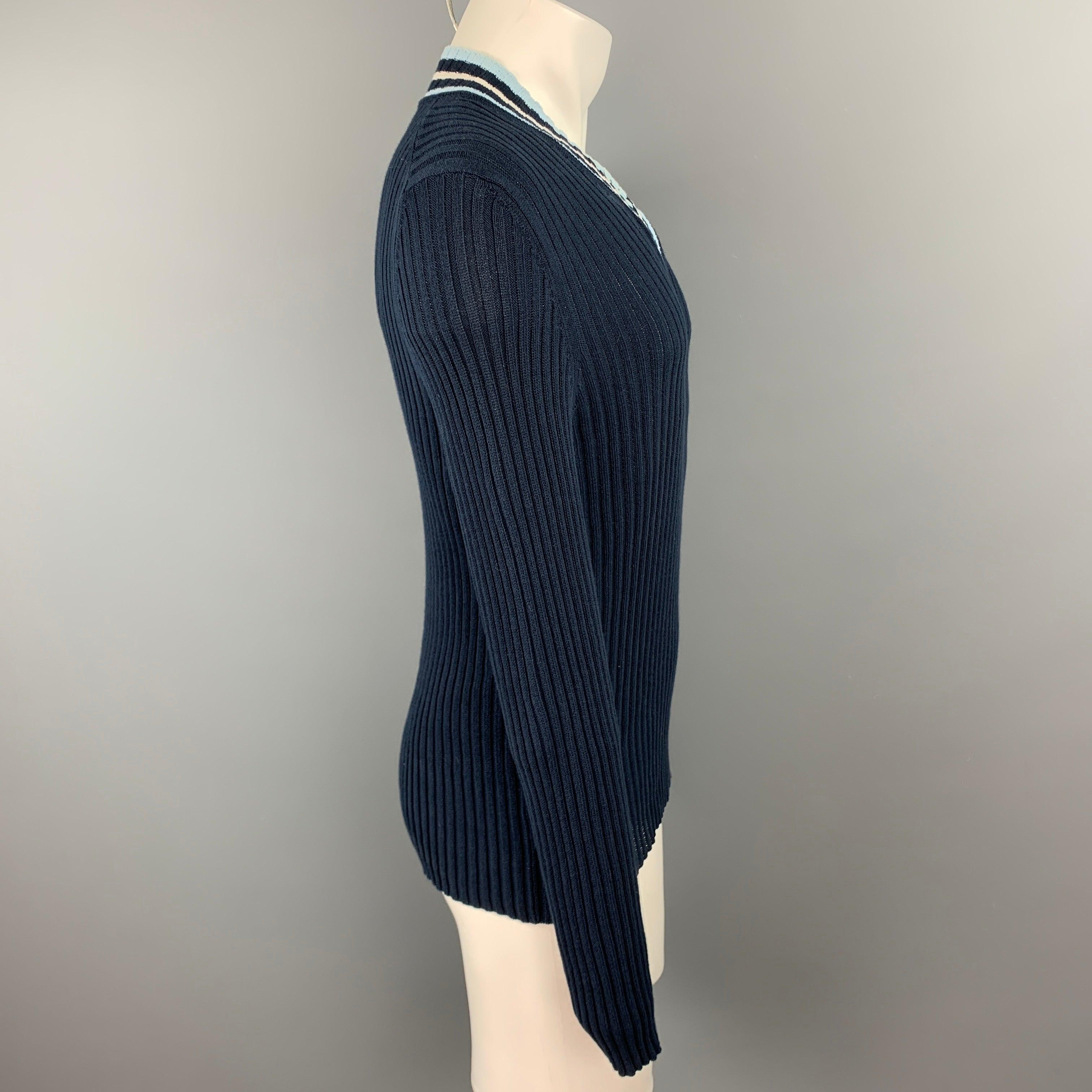 JOHN BARTLETT pullover comes in a navy knitted cotton featuring a slimt fit, striped trim, and a v-neck. Made in Italy.Good
Pre-Owned Condition. 

Marked:   54 

Measurements: 
 
Shoulder: 18 inches 
 Chest: 36 inches  Sleeve: 28.5 inches  Length: