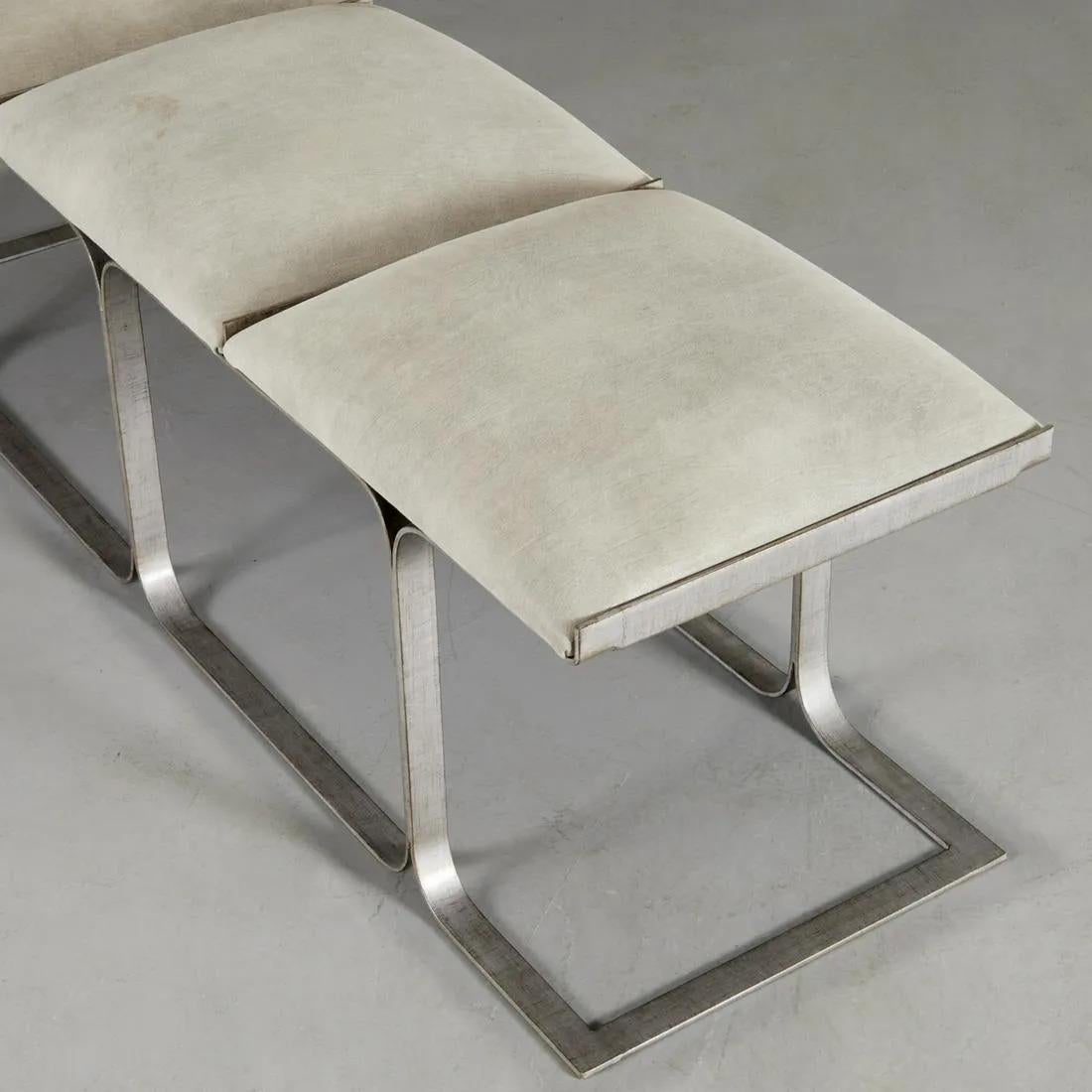 John Behringer 3-seat bench for J.G. Furniture Co. The sculptural frame is nickeled brass with leather covered seats.