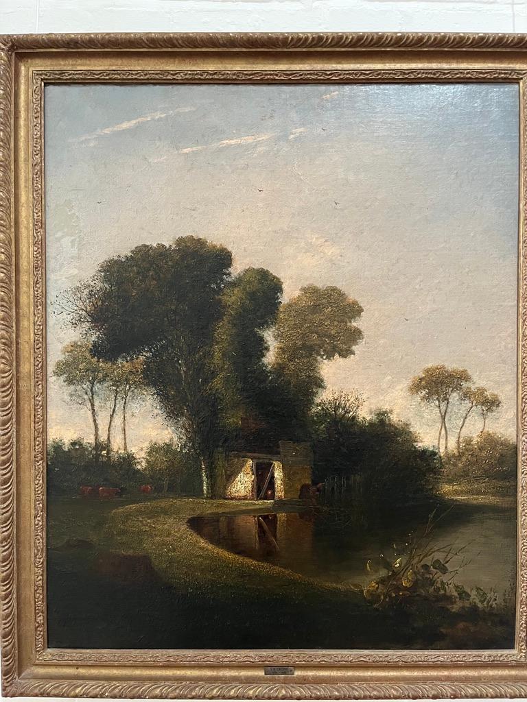 A very atmospheric view of a cottage or outhouse by a pond. The artist has given wonderful texture to the paint to simulate the appearance of the foliage of the trees and vegetation to the foreground of the painting. The scene imbued with a dusky