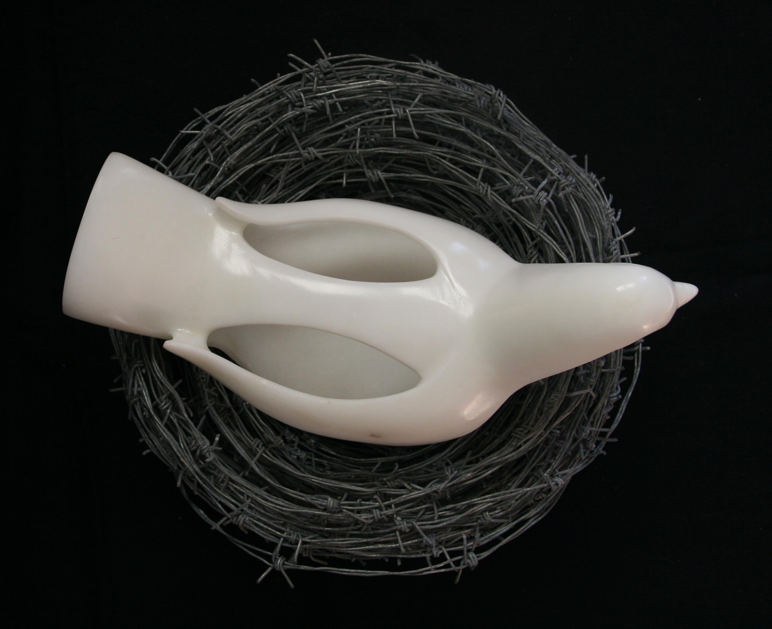 This one-of-a-kind sculpture is created using Italian Statuario Marble with a Barbed Wire 'nest'. It is signed on the bottom by the artist. The Barbed Wire is removable for hassle-free shipping and Installation. 

John Bizas (Greek, b. 1980)