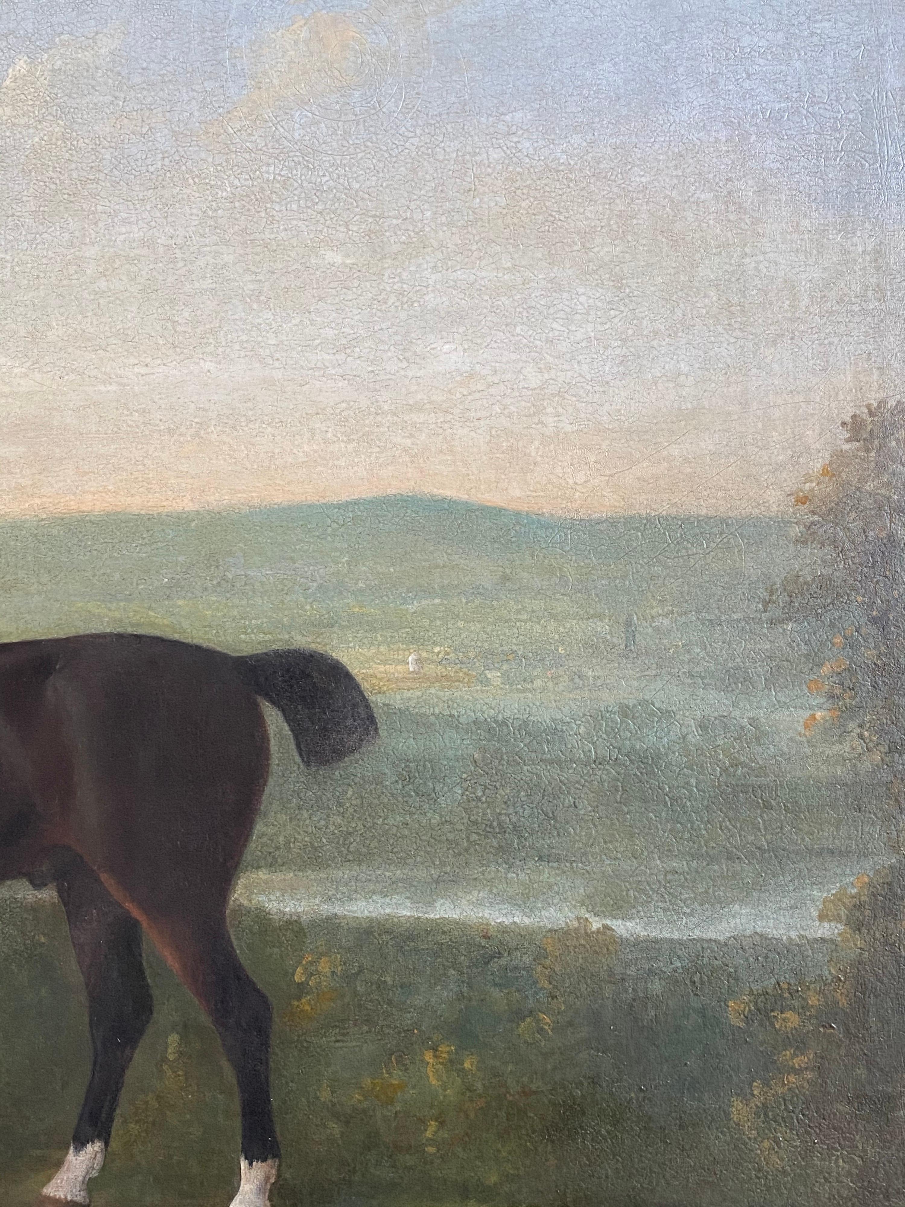A large 18th-century painting chestnut Horse and a young bay stallion with two accompanying dogs in an extensive English landscape. Oil on canvas in a period giltwood frame. 

Dimensions: 117 x 142cm (46 x 56in.)

Provenance: 

Canterbury Auction