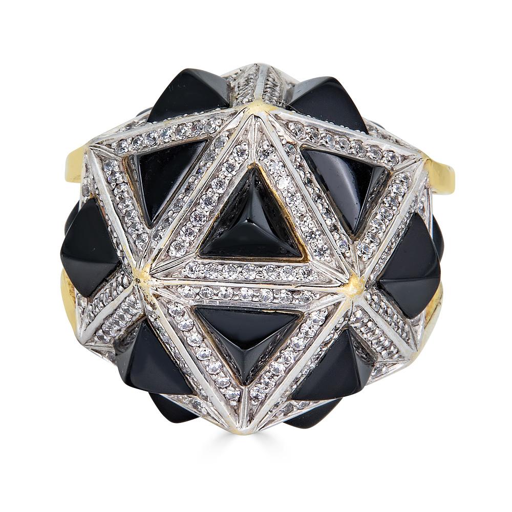 This limited edition ring by John Brevard is inspired by sacred geometry and shaped like an icosahedron, the last of the platonic solids revered by ancient philosophers. With 18 pyramidal sides made of black sapphires and lined with sparkling white