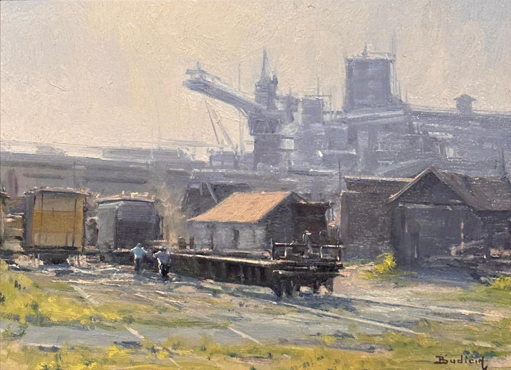 Painting Size (unframed): 9" x 12"
Framed Size: 14" x 17"

"Working on the Train" by John Budicin presents an atmospheric industrial scene, capturing rail yard structures through soft tonal transitions and confident painterly strokes. The muted