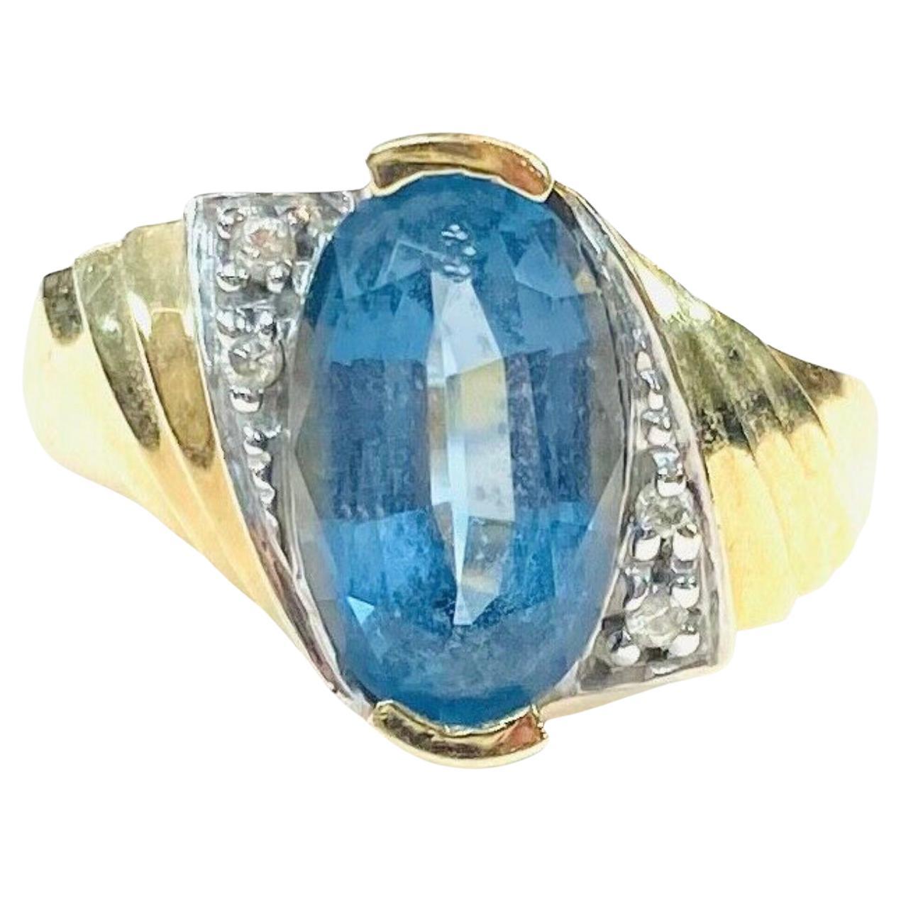 John C Rinker Blue Topaz 14K Yellow Gold and Diamond Ring