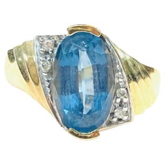 Vintage John C Rinker Blue Topaz 14K Yellow Gold and Diamond Ring