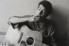 Bob Dylan, New York [holding cigarette & guitar], 1962/Printed 2005