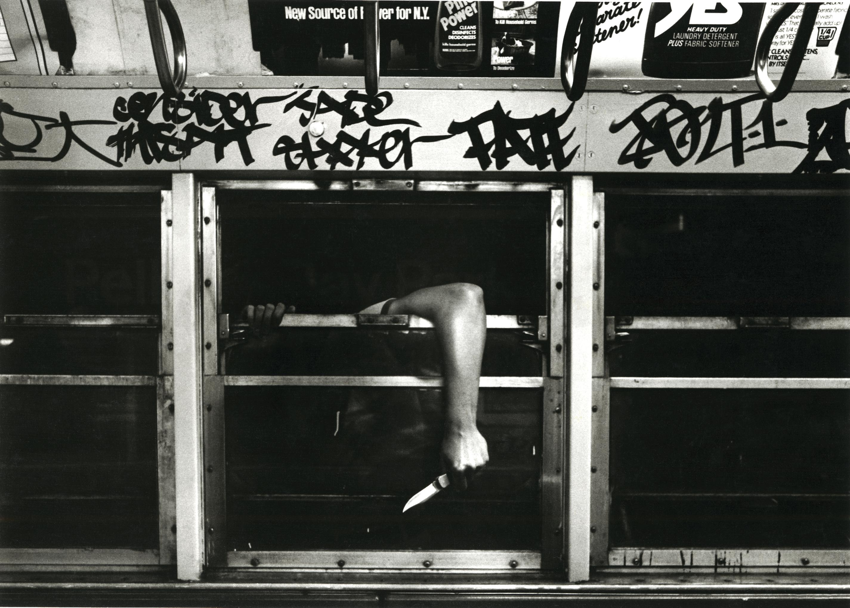John Conn Figurative Photograph - Subway 37, Black & White, Limited Edition Photograph, NYC, 1981, Unframed, Knife