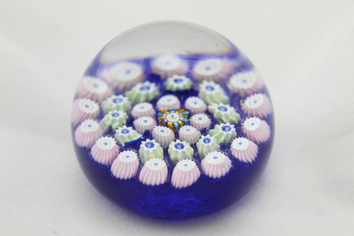 John Deacons Scotland Bunch of Flowers Millefiori Magnum Paperweight

Additional information: 
Dimensions: 5 W x 5 D x 4 H cm 
Period of Time: 1900
Country of origin: Scotland
Condition: Good
