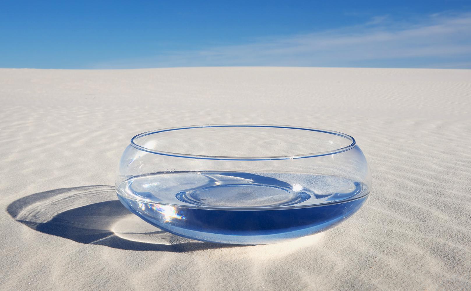 John Dean Abstract Photograph - 'Cool Clear Water' - still life photography - water - vase - sand - blue