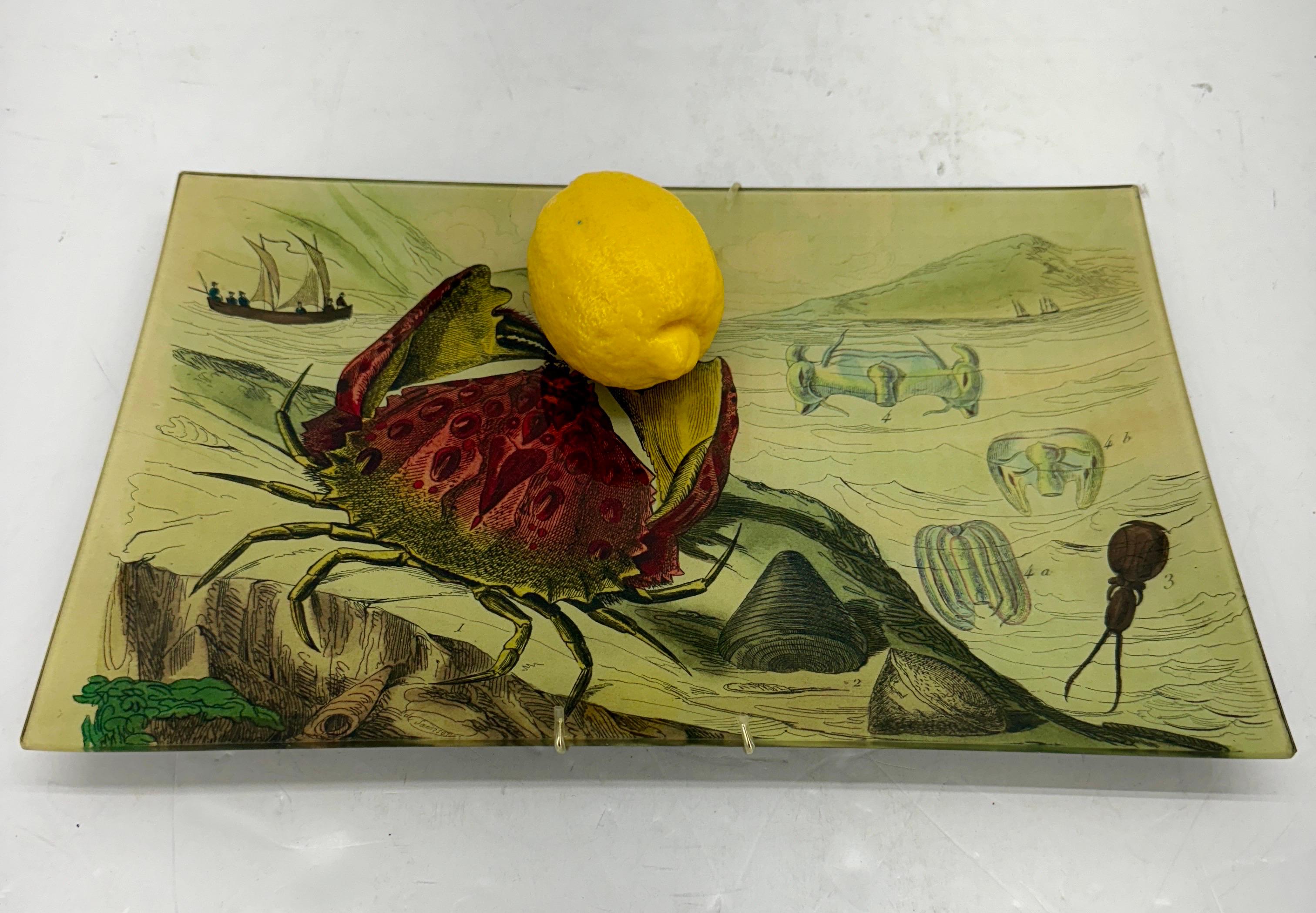 Handmade John Derian Signed Sea Life Crab Boat Decoupage Tray

Since 1989, John Derain and a small studio of artisans in New York City have been creating glass plates, trays, bowls, and other decorative home items with decoupage from his vast and