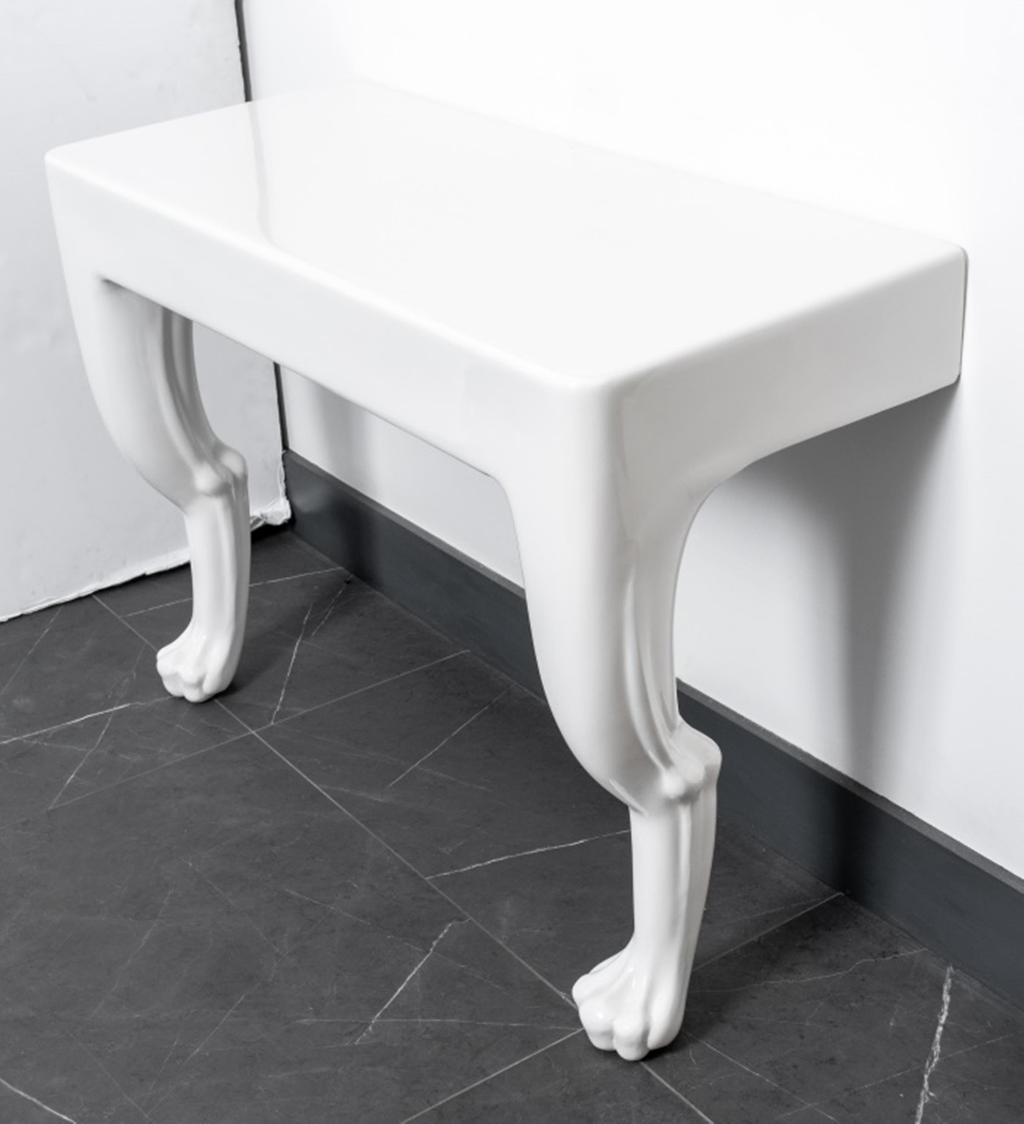 John Dickinson (American, 1920-1982) modern minimalist zoomorphic leg wall mounted console in gel-coated fiberglass, late 20th century. Measures: 30.25