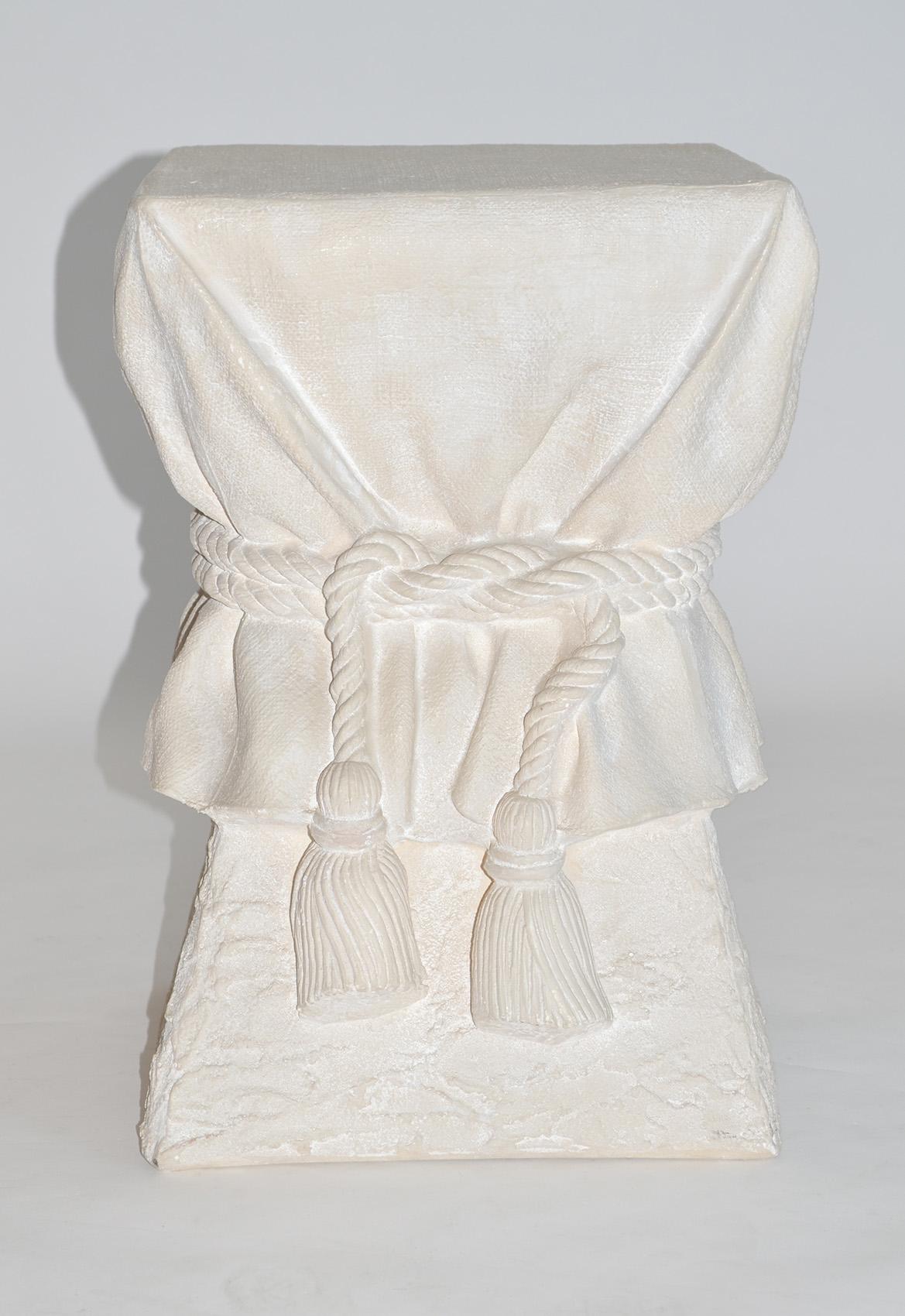 John Dickinson Style Plaster Faux Bois Draped Rope and Tassel Side Table 

This unique side table is a true work of art, crafted entirely in plaster to create a stunning sculptural piece that doubles as functional furniture. Inspired by the iconic