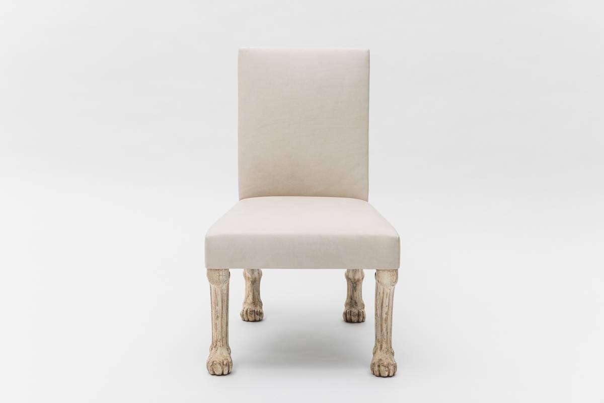John Dickinson’s legendary Etruscan Chair is covered in a parchment leather with wooden legs in an ivory craquelure finish. An example of this iconic design is featured in the permanent collection of the San Francisco MoMA. Heralded as one of the