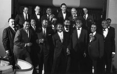 Frank Sinatra posing with Count Basie and his band, Las Vegas, 1964