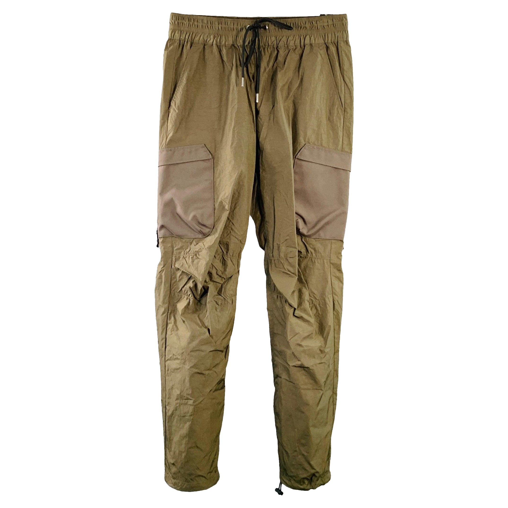 JOHN ELLIOTT Pantalones casuales con cordón de nailon verde oliva talla 30 en venta