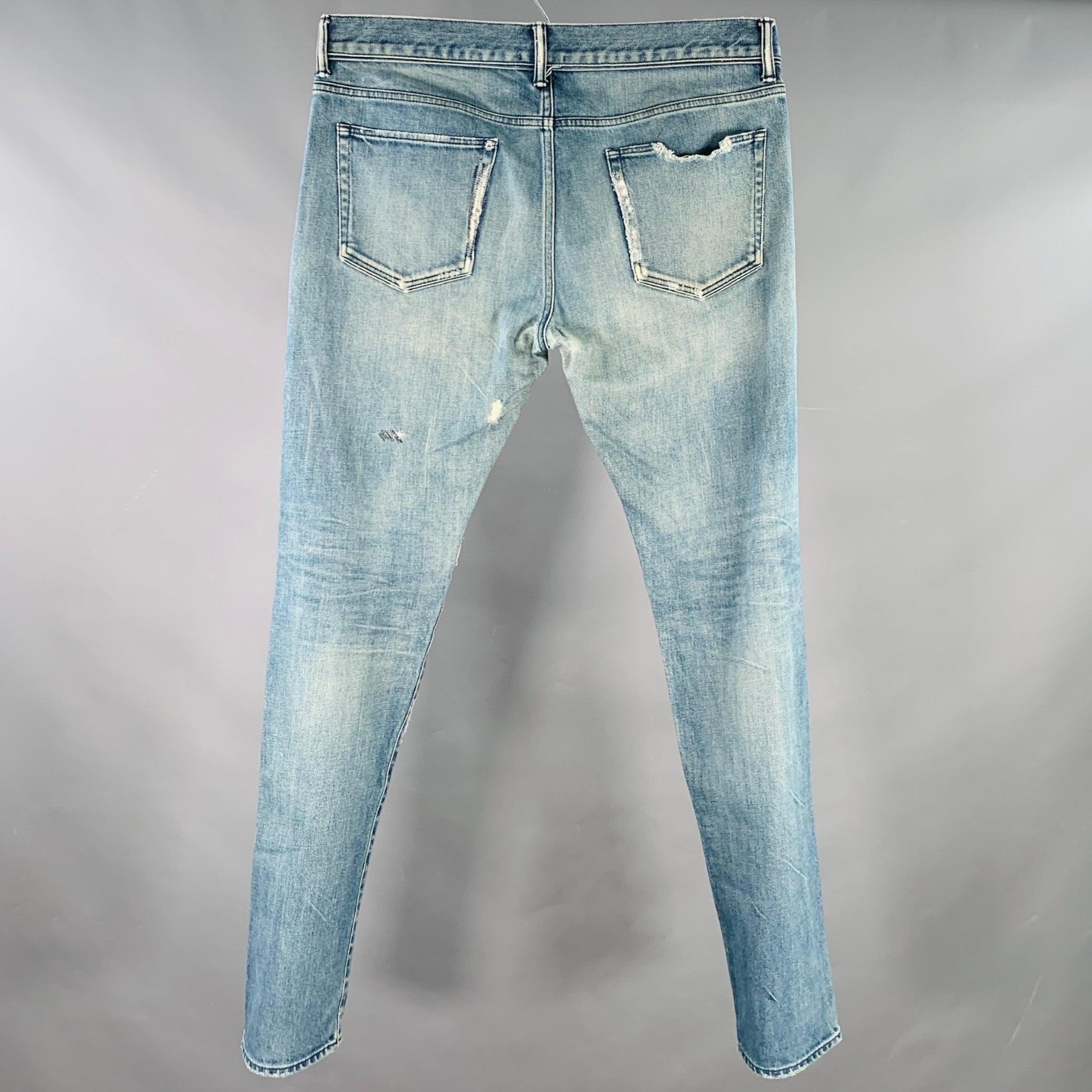 JOHN ELLIOTT Size 34 Blue Distressed Cotton Blend Button Fly Jeans In Excellent Condition For Sale In San Francisco, CA
