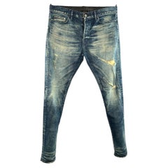 JOHN ELLIOTT Jeans in Größe 34, blau, im Used-Look, mit Knopfleiste
