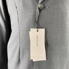 JOHN ELLIOTT Blazer recortado de lana gris con doble botonadura talla 42