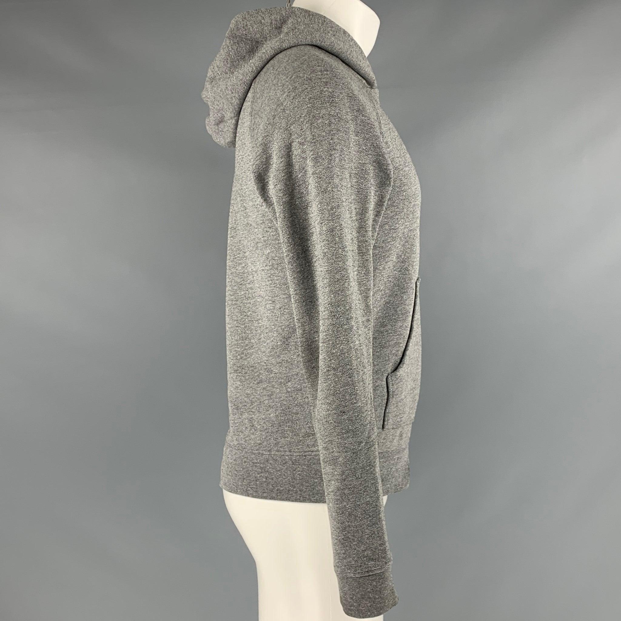 JOHN ELLIOTT sweatshirt
in a
heather grey cotton blend fabric featuring a hooded style, and kangaroo pockets. Made in USA.Very Good Pre-Owned Condition. Signs of wear at the cuffs. 

Marked:   1 

Measurements: 
 
Shoulder: 17.5 inches Chest: 39