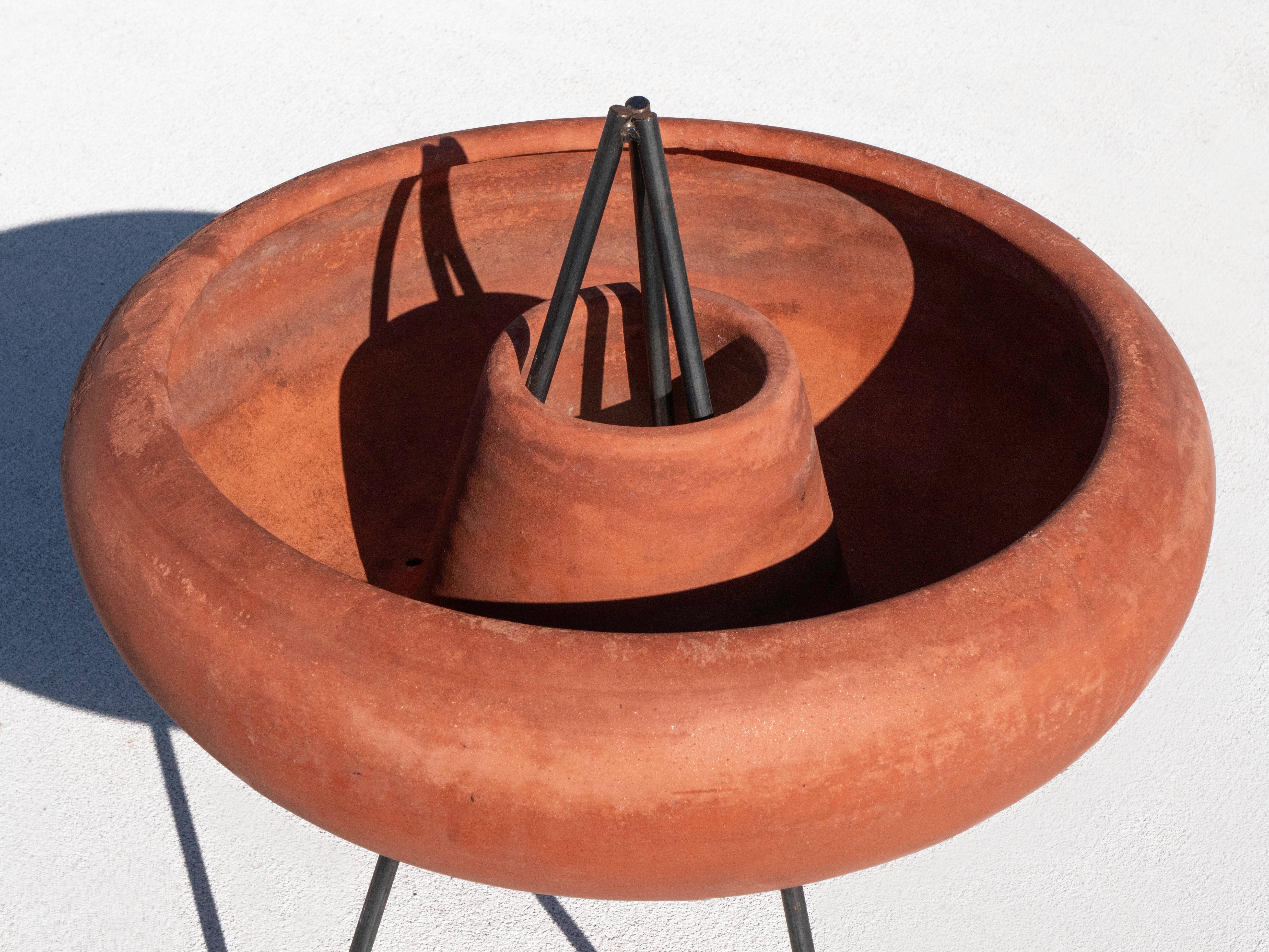 John Follis & Rex Goode Sombrero Planter for Architectural Pottery, circa 1950's.  Very rare unglazed terracotta.  The AP catalog shows this piece as Model M-109.  

We have 2 of these available, see other listings.  This is sombrero  1 of 2.  

In
