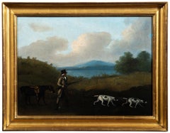 A Gentleman shooting in a landscape with a horse and spaniels