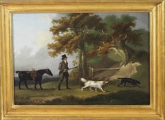 Gentleman photographiant dans un paysage avec un cheval et des épagneuls