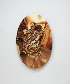 Shiny oval steel artwork with golden mirrored surface with ax cuts 120 x 60 cm