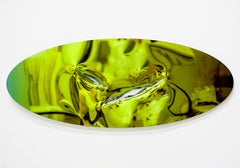 Shiny oval steel artwork with yellow green mirrored surface 48 x 120 cm 