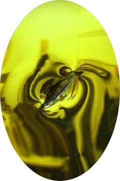Shiny oval steel artwork with yellow green mirrored surface 63 x 42 cm