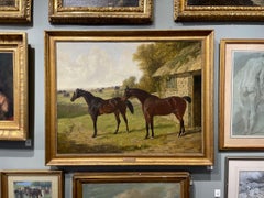 A stallion and a filly, in a landscape Signed and dated J F Herring 1840