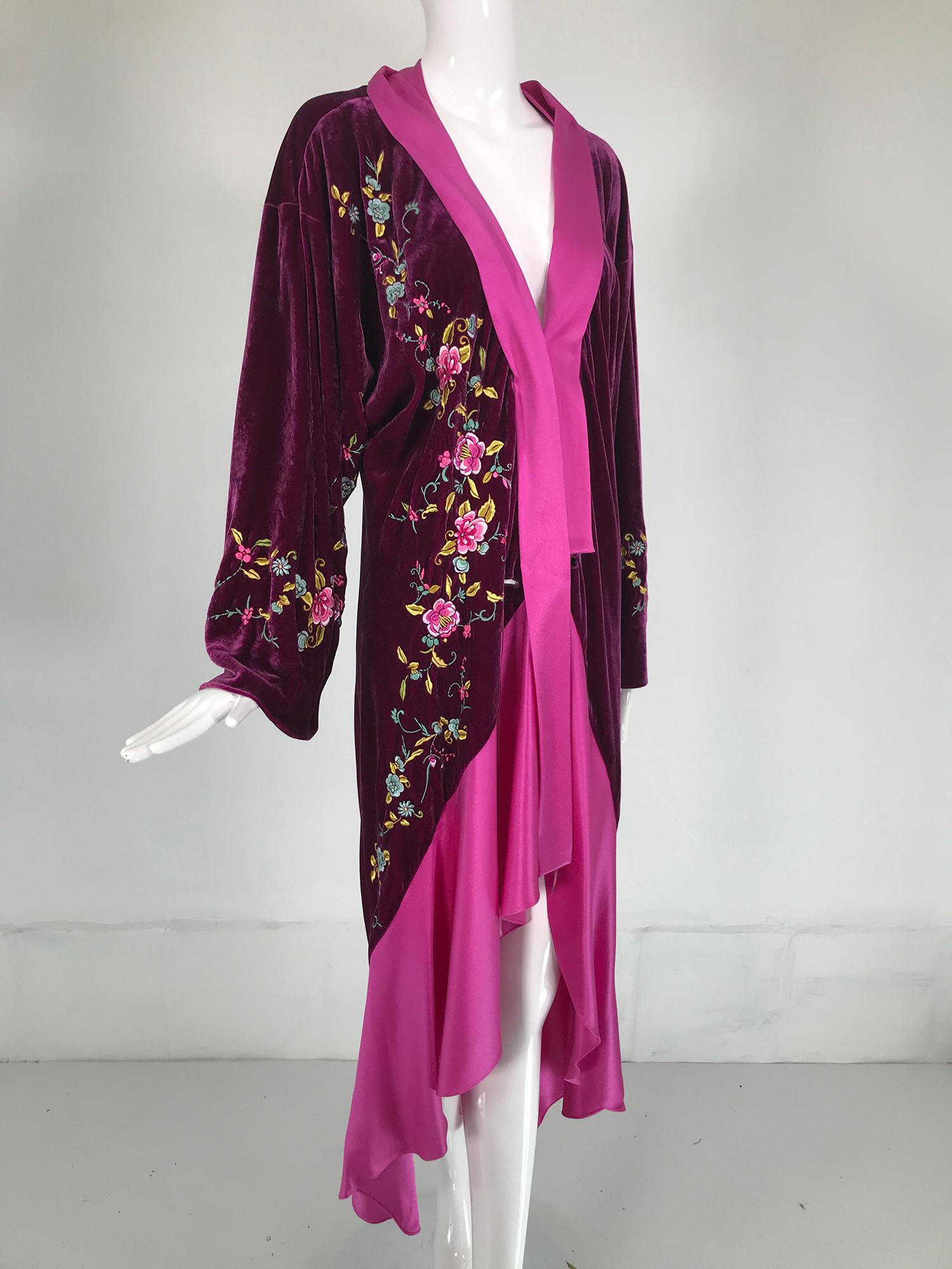 John Galliano 1920s inspired embroidered velvet & silk evening coat, early 2000's. Rare to find Galliano coat in wine velvet with colourful floral embroidery. The coat has dropped shoulders & wide kimono sleeves with embroidered detail. Bias cut