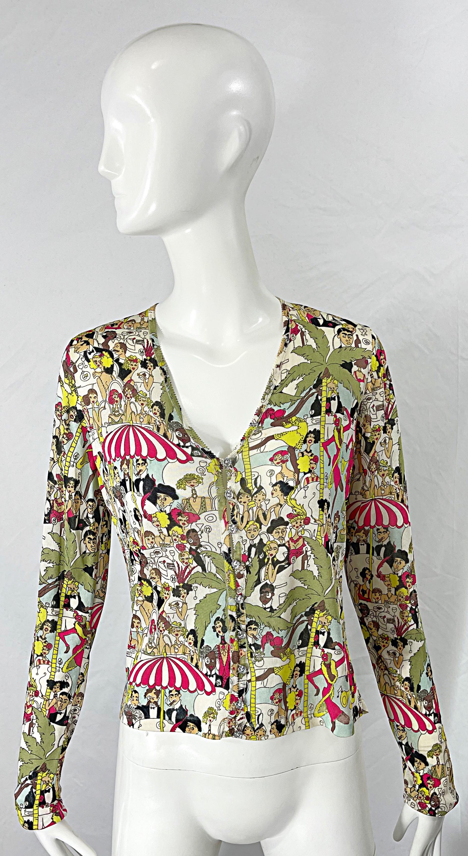 Rare 1990s JOHN GALLIANO Great Gatsby Roarin' 20s novelty print rayon cardigan ! Features rhinestone buttons up the front. Lightweight soft rayon fabric stretches to fit. Can easily be worn layered or alone any time of year. In great conditon 
Made