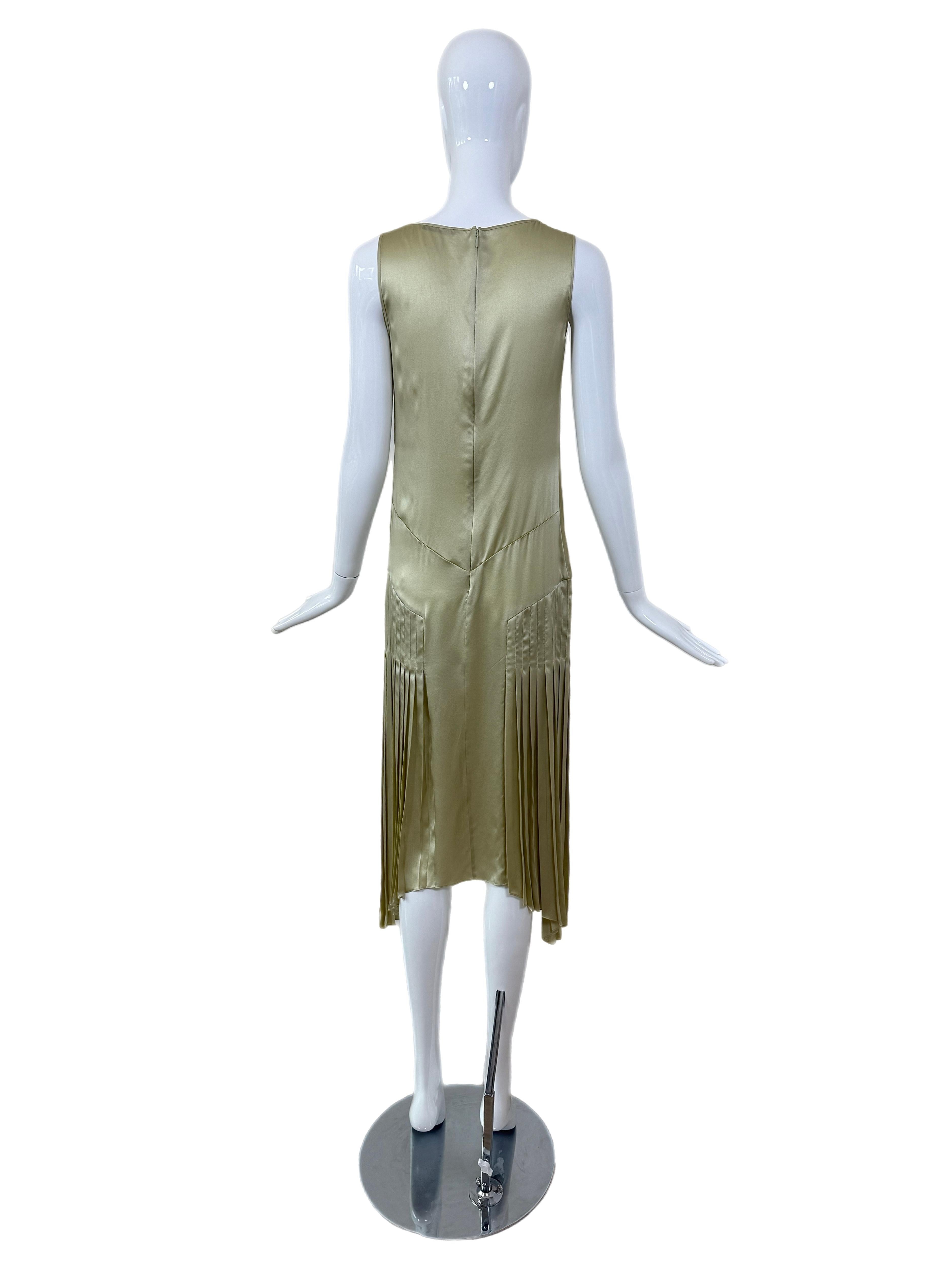 John Galliano
AW18
NWT's no flaws
F34, not meant for a tight fit
Delicate Celery Green color
The softest silk
Draping and pleats
Measurements in inches laying flat: length 46, pit to pit 14 to 16, waist 14.5

FINAL SALE 