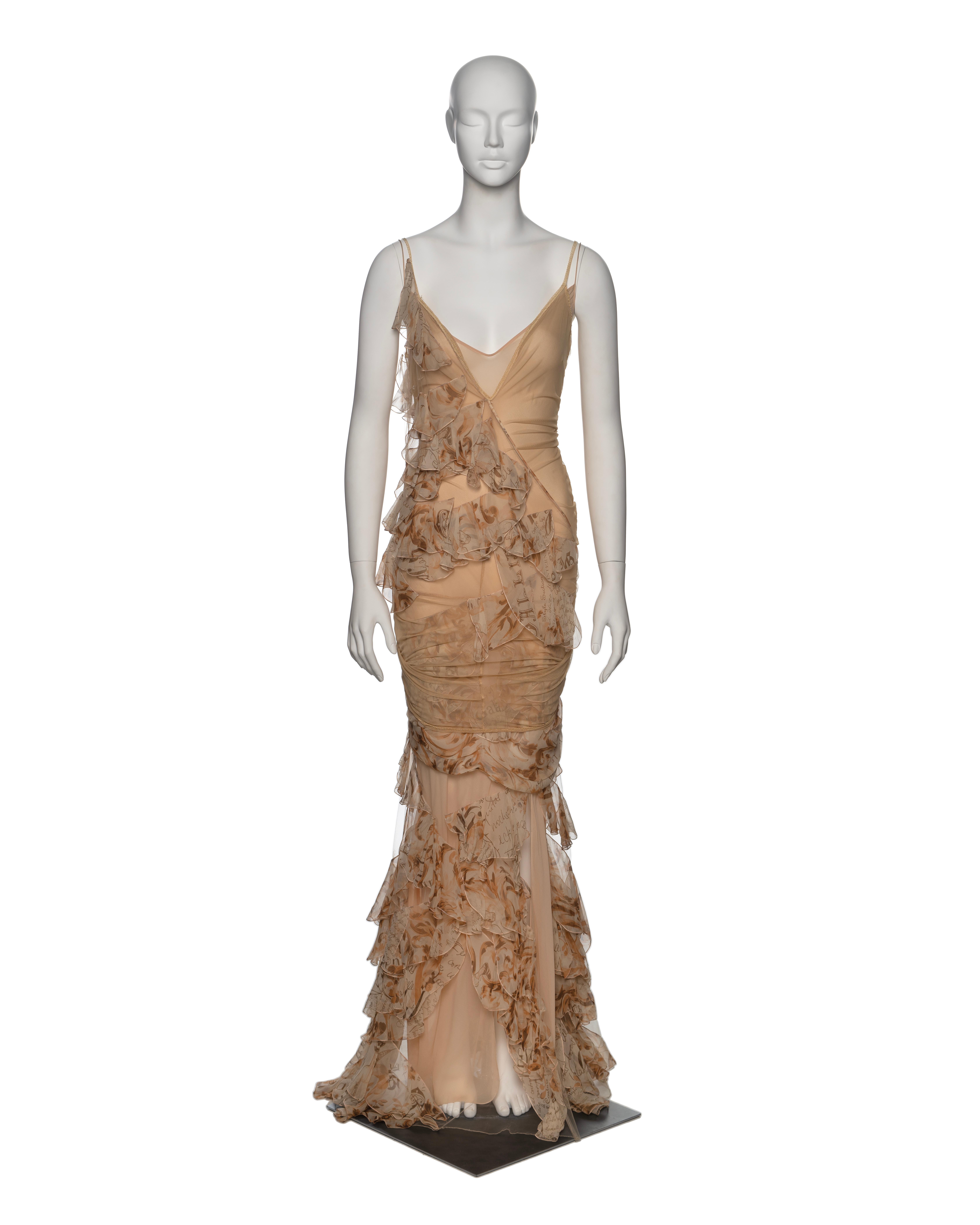 ▪ Brand: John Galliano
▪ Creative Director: John Galliano
▪ Collection: Spring-Summer 2006
▪ Fabric: Lining and Inserts - 100% Silk, Tulle - Polyamid, Elastane 
▪ Details: Beige stretch tulle maxi dress adorned with ruffled silk chiffon inserts,