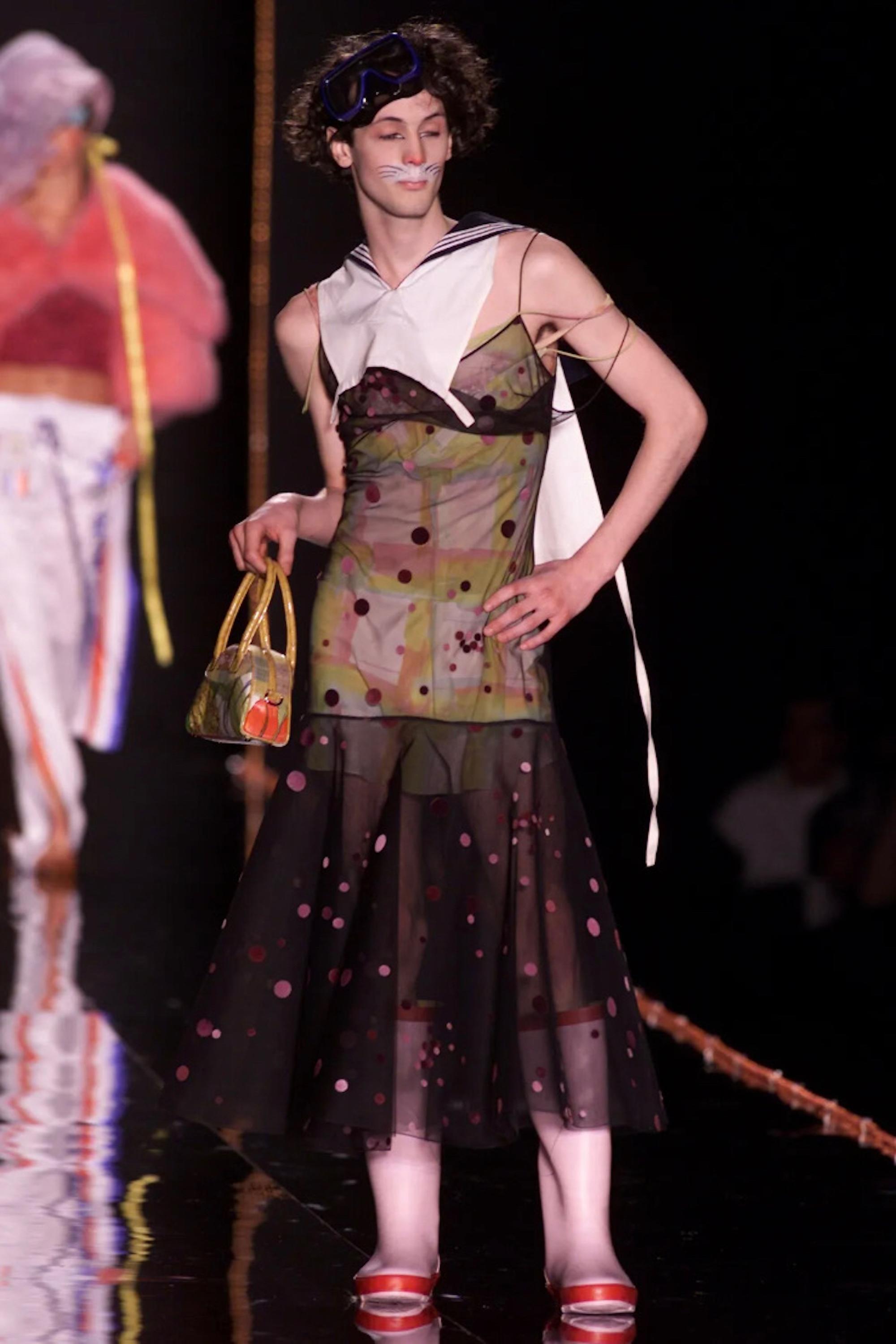 - Autumn / Winter 2000

- Sold by Mae Vintage 

- Silk chiffon bias-cut dress in a green snakeskin print

- Spaghetti straps, asymmetric handkerchief hem and signature double fronted design

- Bias cut so flexibility in width and length -measured