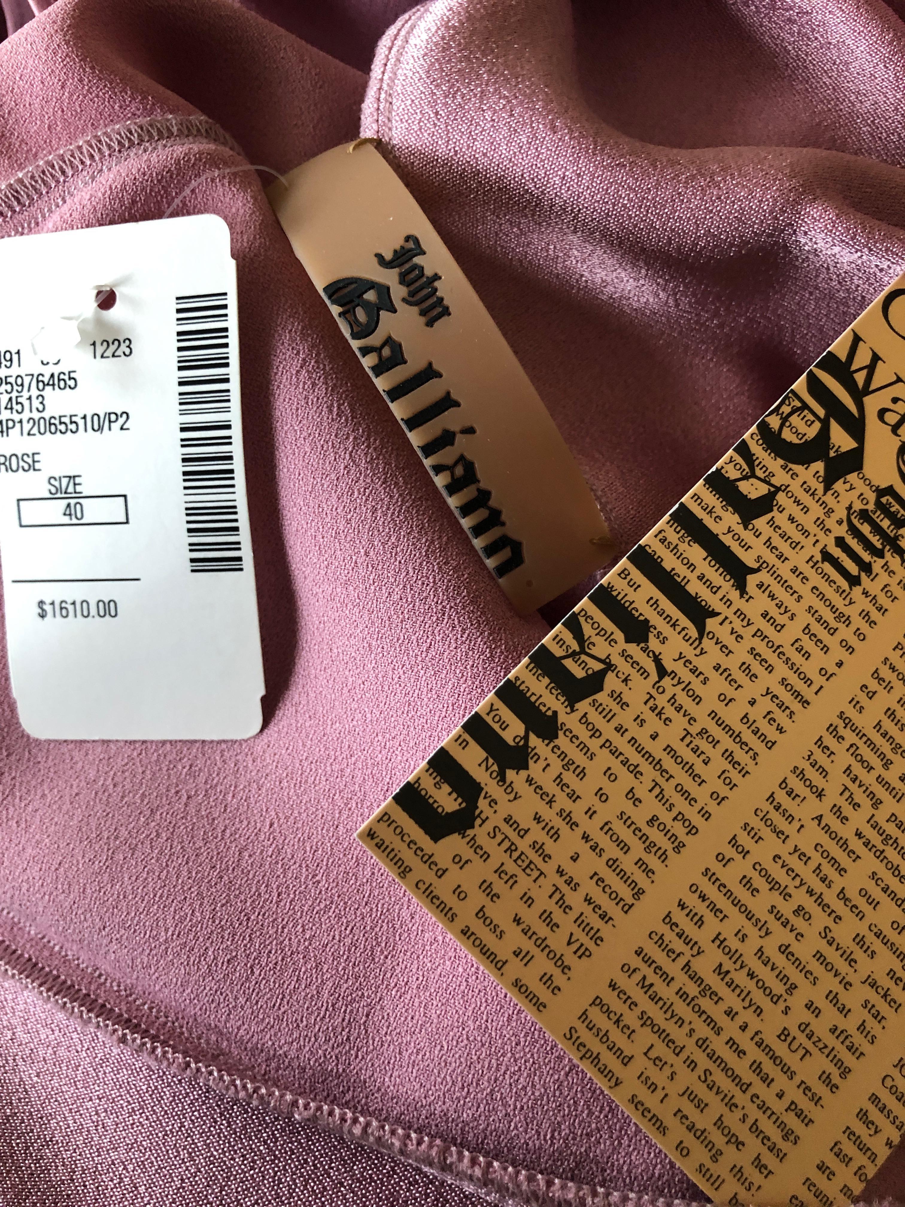 John Galliano 1990's Bias Cut Rose Color Diamond Pattern Cowl Front Dress.
From the early 90's, this has a matte / shine treatment.
New with tags, this retailed for $1610
Size 40
Bust 42'
Waist 32
