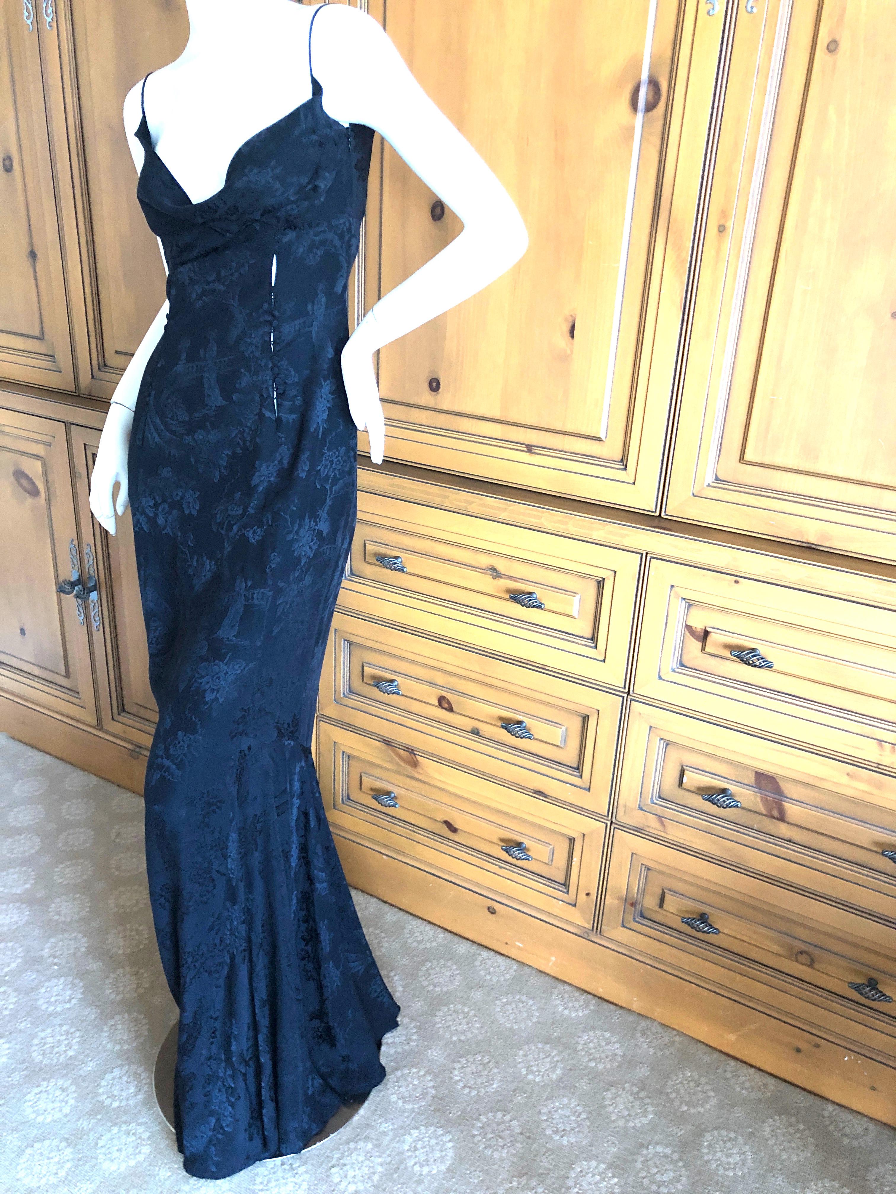 John Galliano Black Bias Cut Chinoiserie Toile de Joi 1990's Evening Dress .
Featuring many silk button details , very unusual, they are purely decorative, please use zoom feature to examine. All buttons intact and functional .
So pretty, nobody