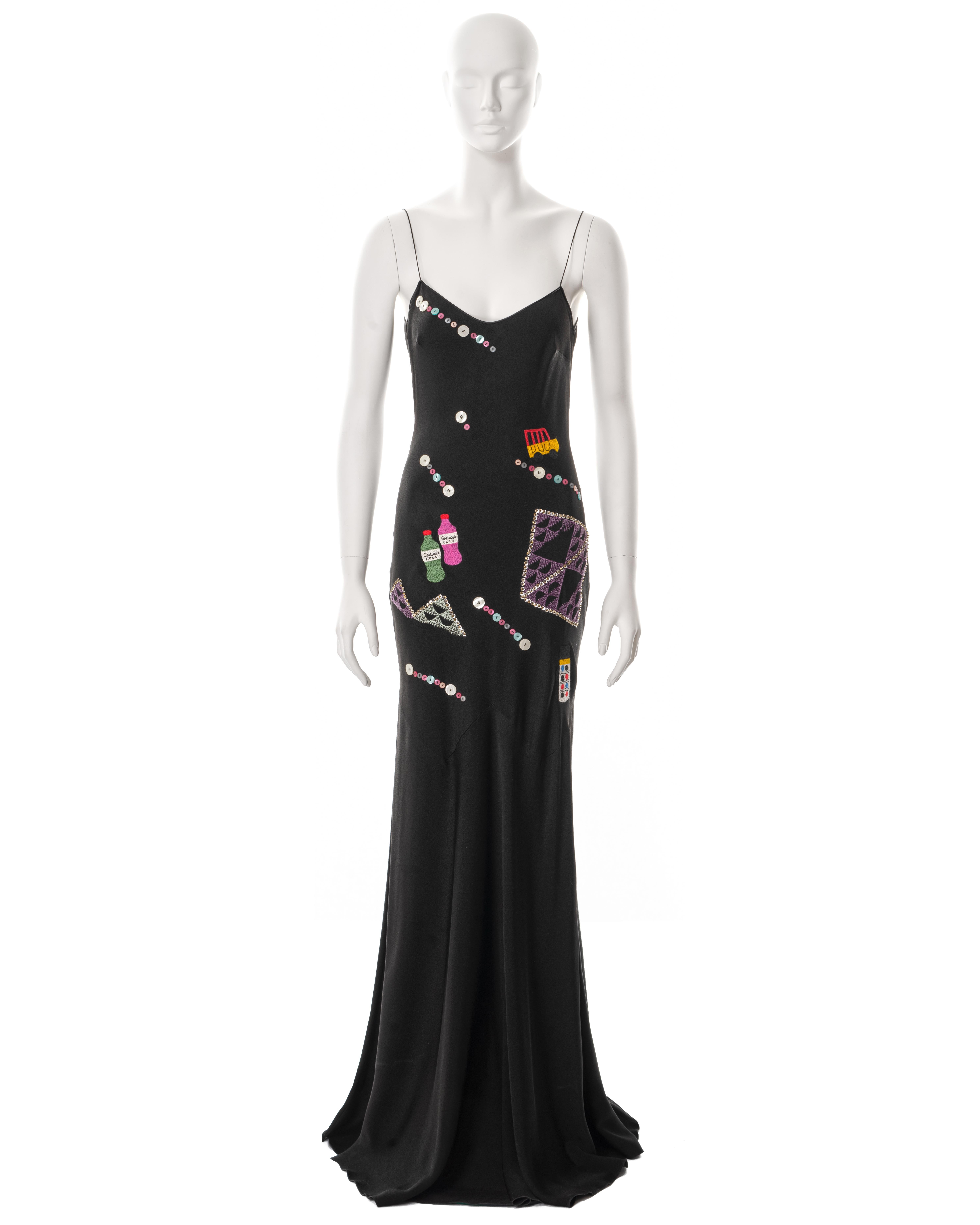 ▪ John Galliano black evening dress
▪ Sold by One of a Kind Archive
▪ Fall-Winter 2004
▪ Constructed from bias-cut acetate-viscose crepe 
▪ Multi coloured novelty embroideries of 'Galliano Soda' bottles 
▪ Decorative buttons 
▪ Floor-length skirt