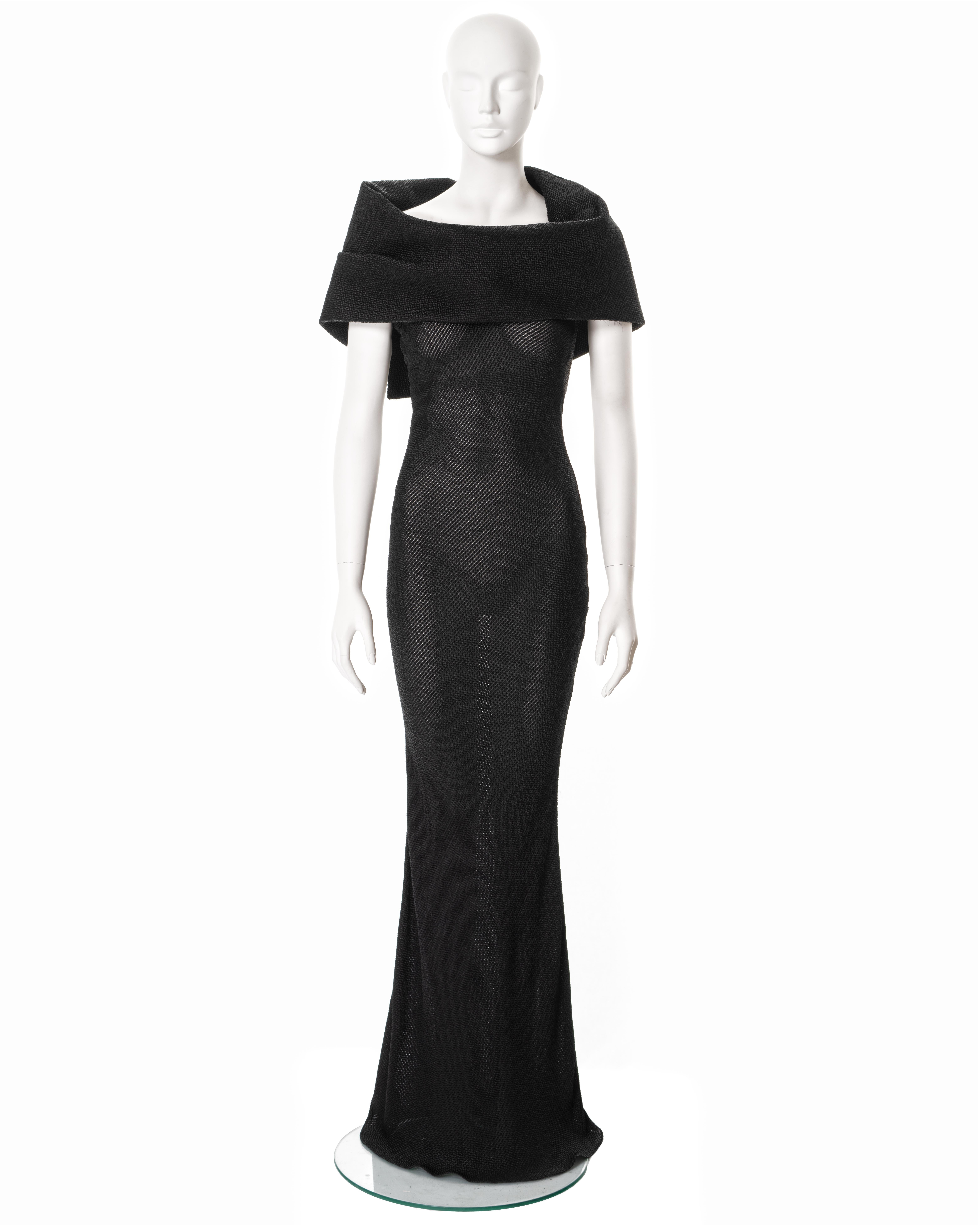 ▪ John Galliano black evening dress
▪ Sold by One of a Kind Archive
▪ Fall-Winter 1999
▪ Constructed from black bias-cut viscose with embroidered silk stripes 
▪ Large draped turn-over collar 
▪ Floor-length skirt 
▪ Size FR 36 - UK 8 
▪ Made in