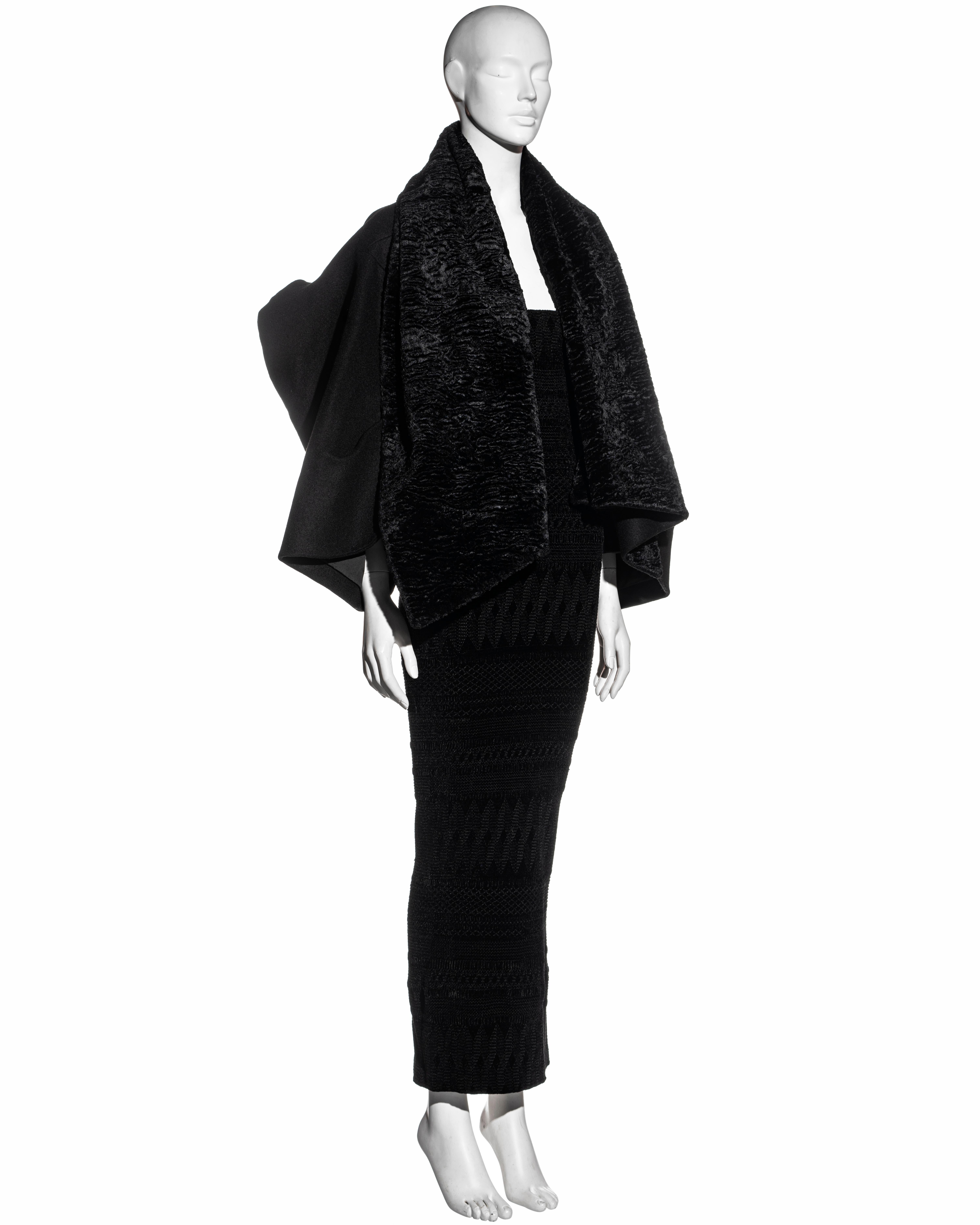 ▪ John Galliano evening ensemble 
▪ Black wool upside down cropped opera coat 
▪ Heavyweight wool 
▪ Broad chenille collar embroidered to imitate astrakhan fur 
▪ Shorter back 
▪ Silk lining  
▪ Embroidered chenille strapless sheath dress 
▪