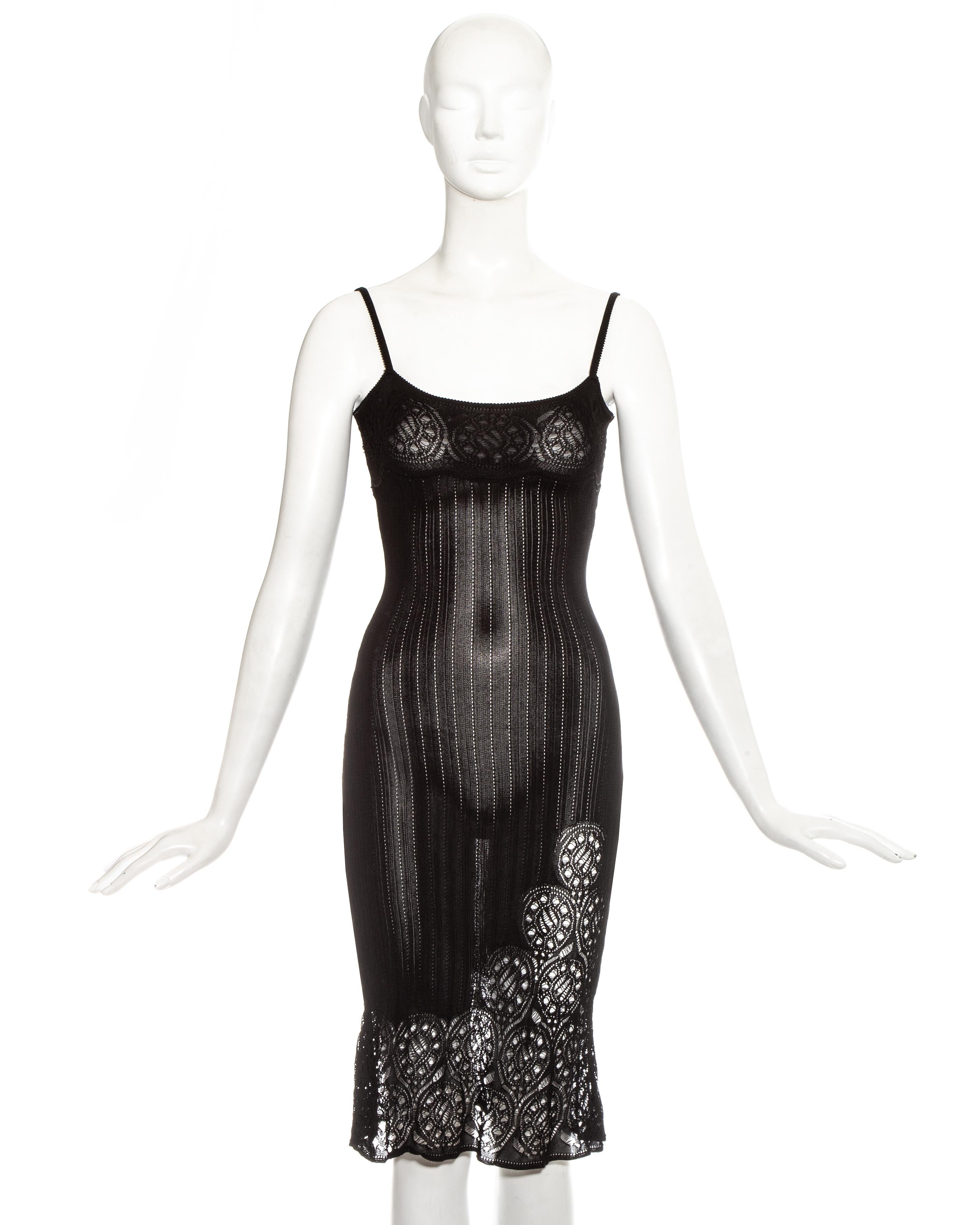 John Galliano, black ribbed figure hugging evening dress with crochet knit trim.

Spring-Summer 1999