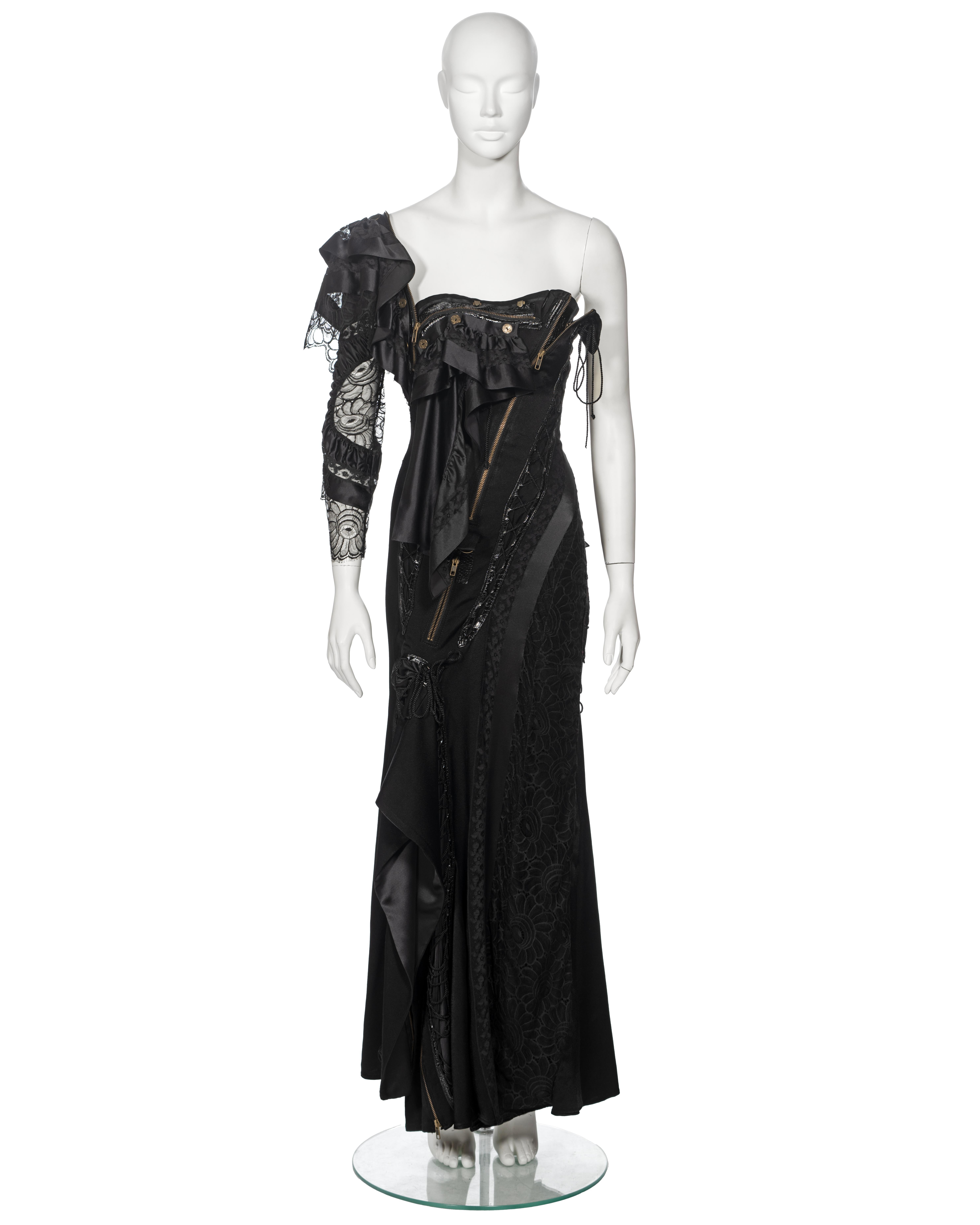▪ Archival Runway John Galliano Evening Dress
▪ Creative Director: John Galliano 
▪ Spring-Summer 2002
▪ Museum Grade
▪ Crafted from an array of fabrics including lace, silk, crepe, and croc-embossed leather, lending the dress a striking