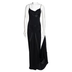 John Galliano vestido de noche formado de crepé negro satinado, ss 1995