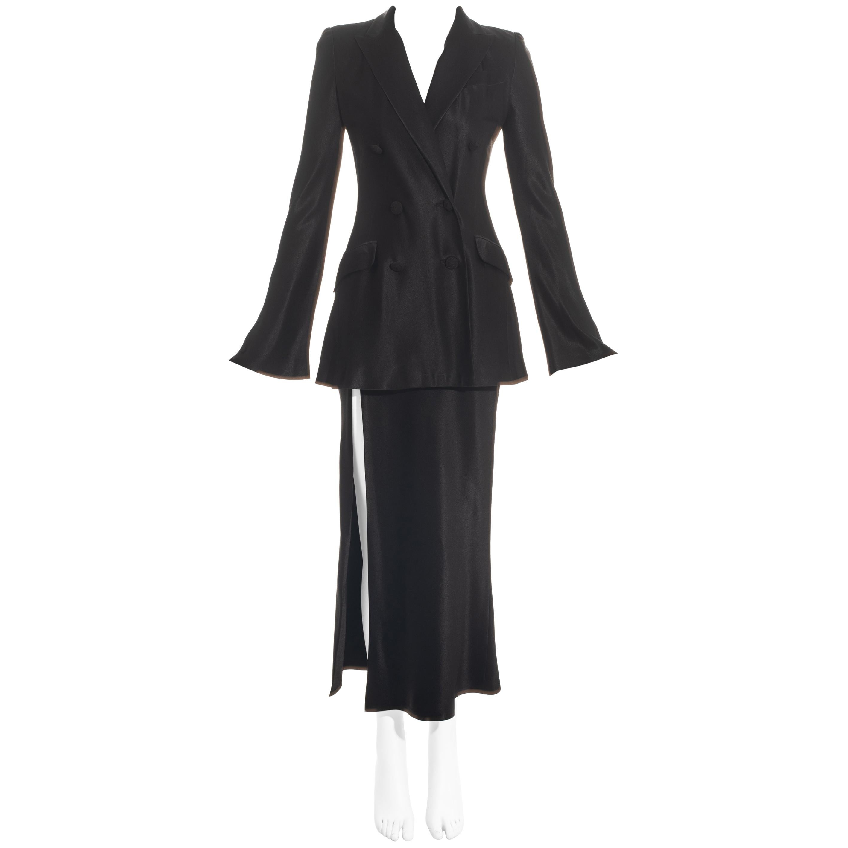 John Galliano black satin double breasted skirt suit with leg slit, fw 1994