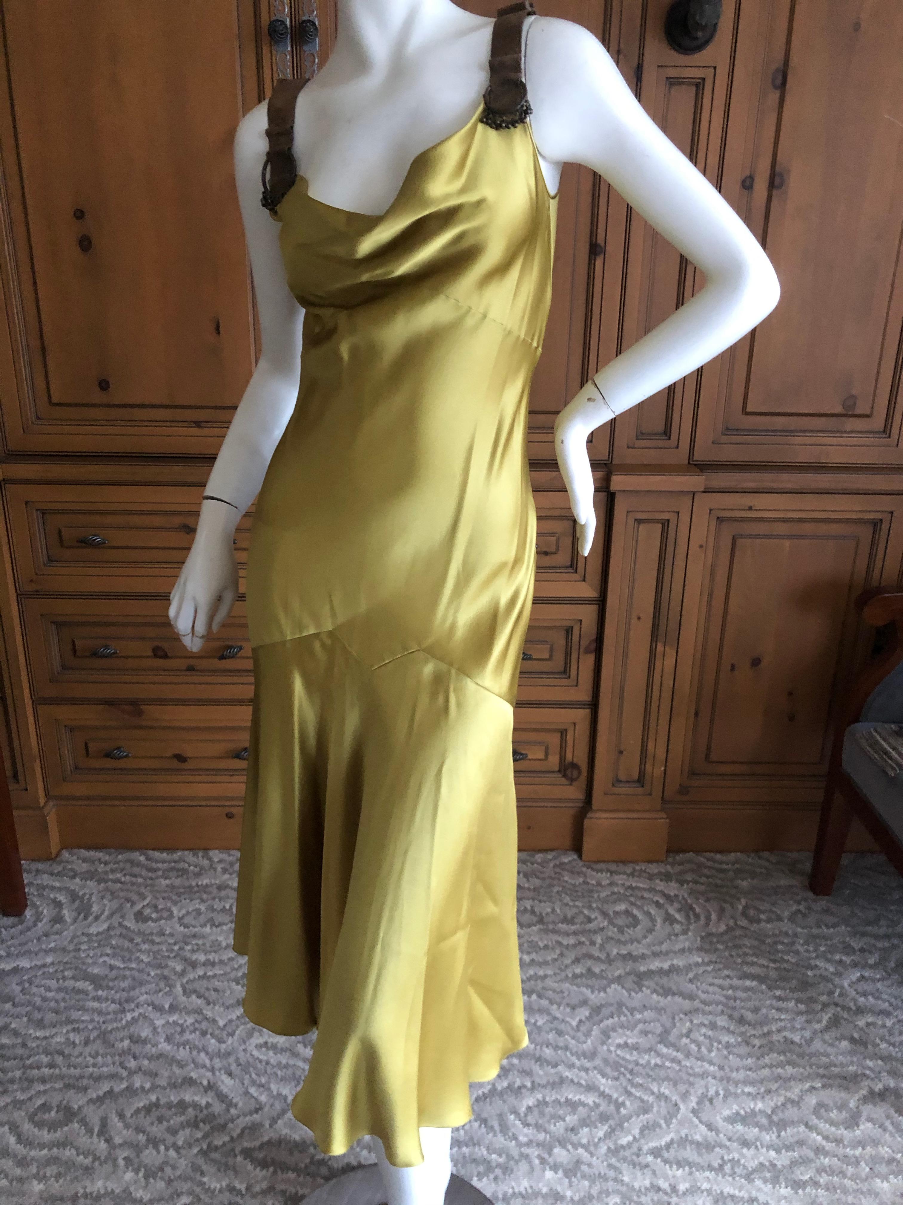 John Galliano Chartreuse Silk Charmeuse Cocktail Dress with Leather Straps.
So pretty, with leather shoulder straps with beaded ornament's.
 Size 38
 Bust 38