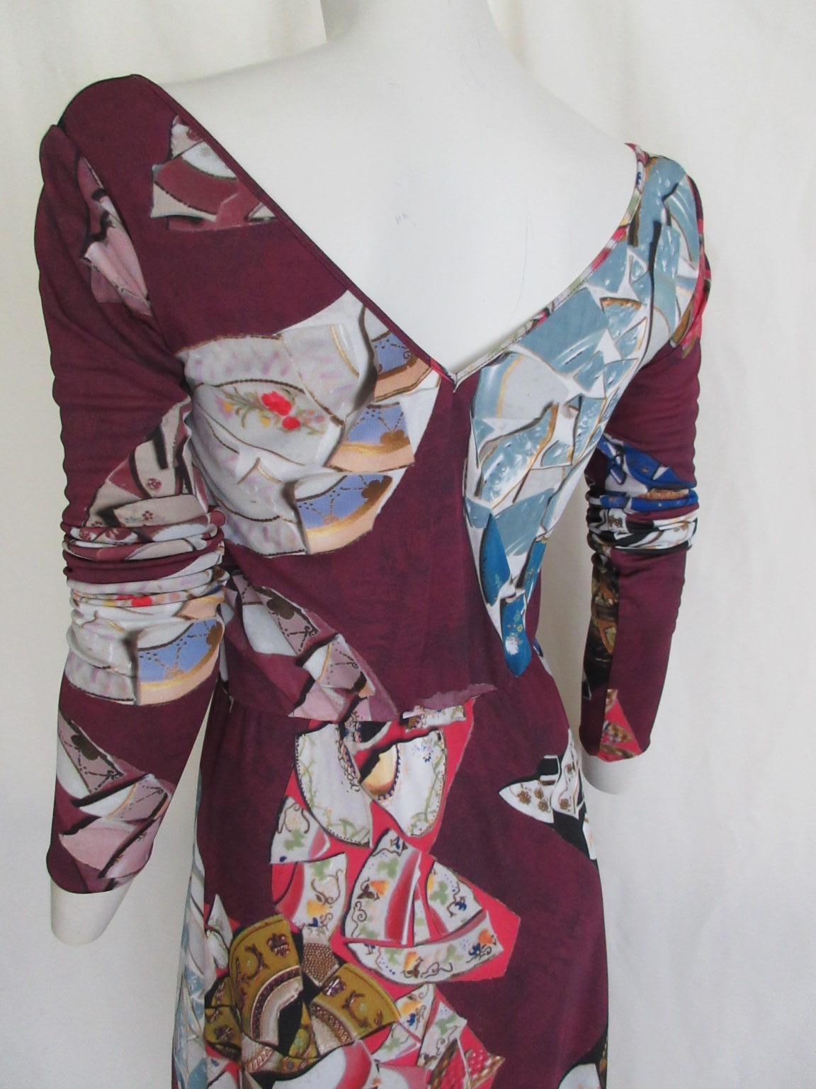 Exclusive John Galliano dress

We offer more exclusive vintage items, view our frontstore

Detais:
This dress is made of stretch fabric with printed details
Side zipper
Size is about small, 26/40, please check measurements

Please note that vintage